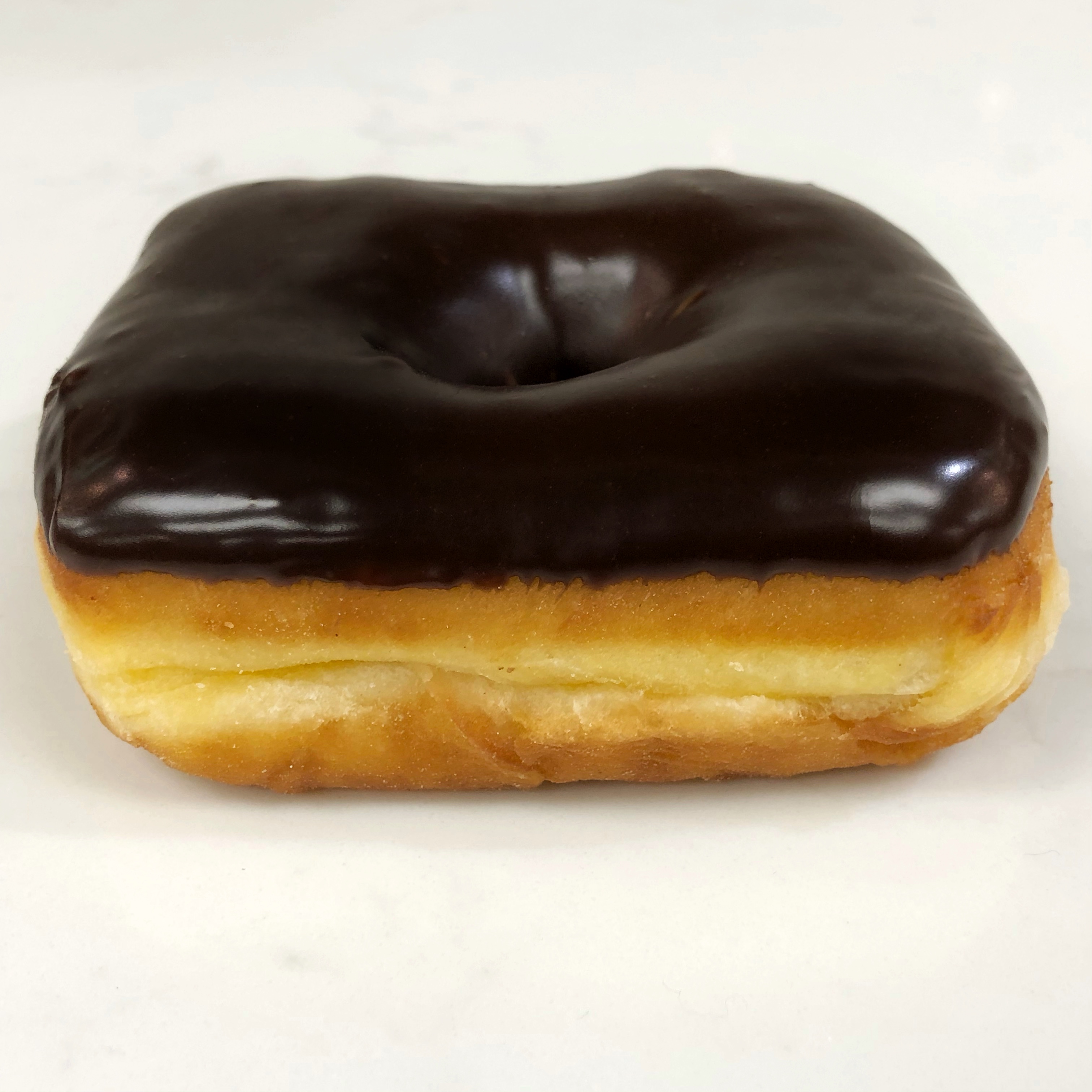 Order Vegan Chocolate Raised Donut food online from The Donuttery store, Huntington Beach on bringmethat.com