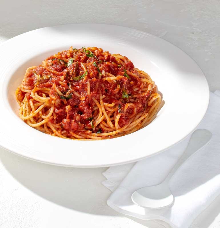 Order TOMATO BASIL SPAGHETTI food online from California Pizza Kitchen store, Hollywood on bringmethat.com