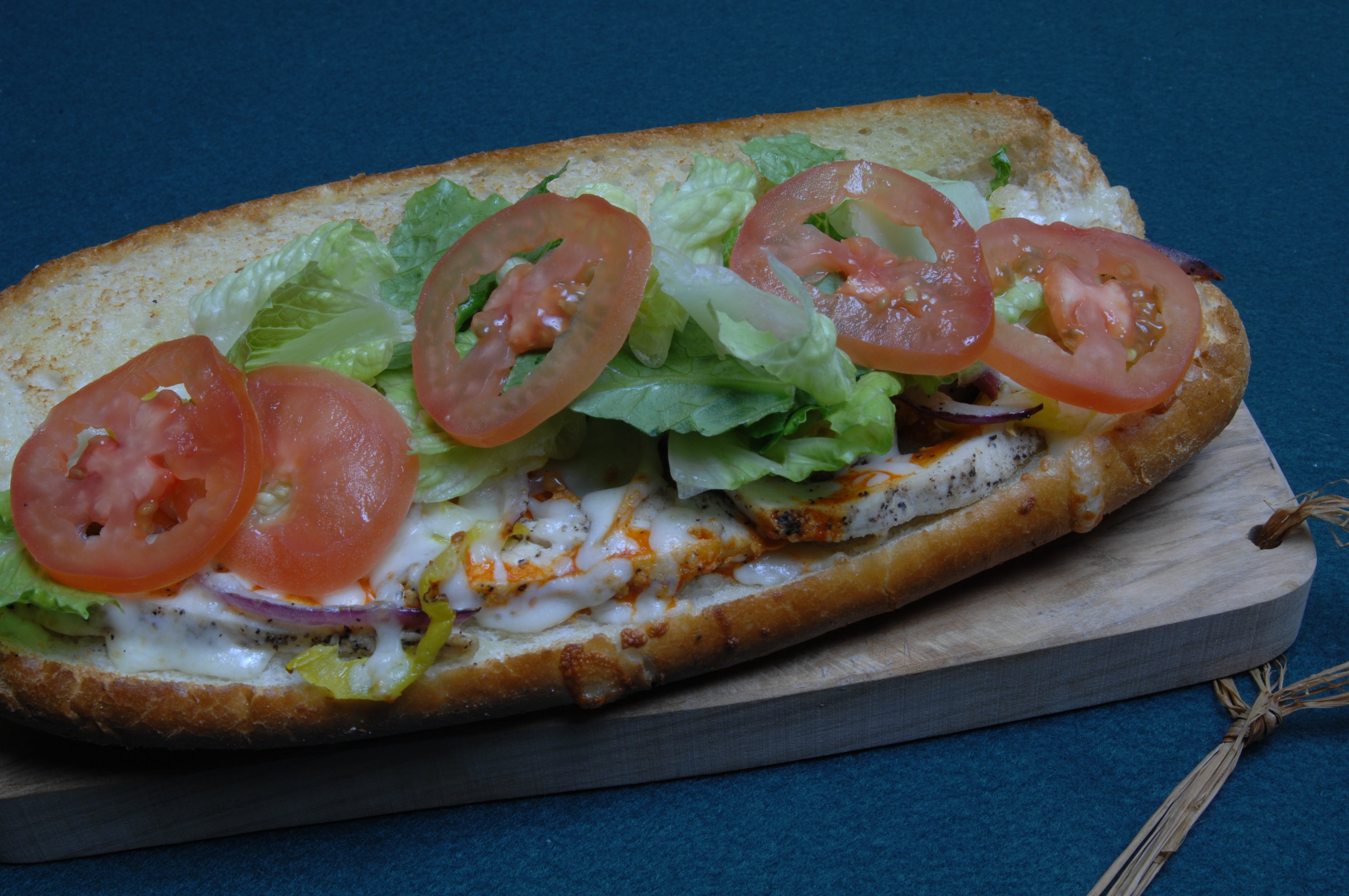 Order Buffalo Chicken Sandwich - Sandwich food online from La Gourmet Pizza store, Dallas on bringmethat.com