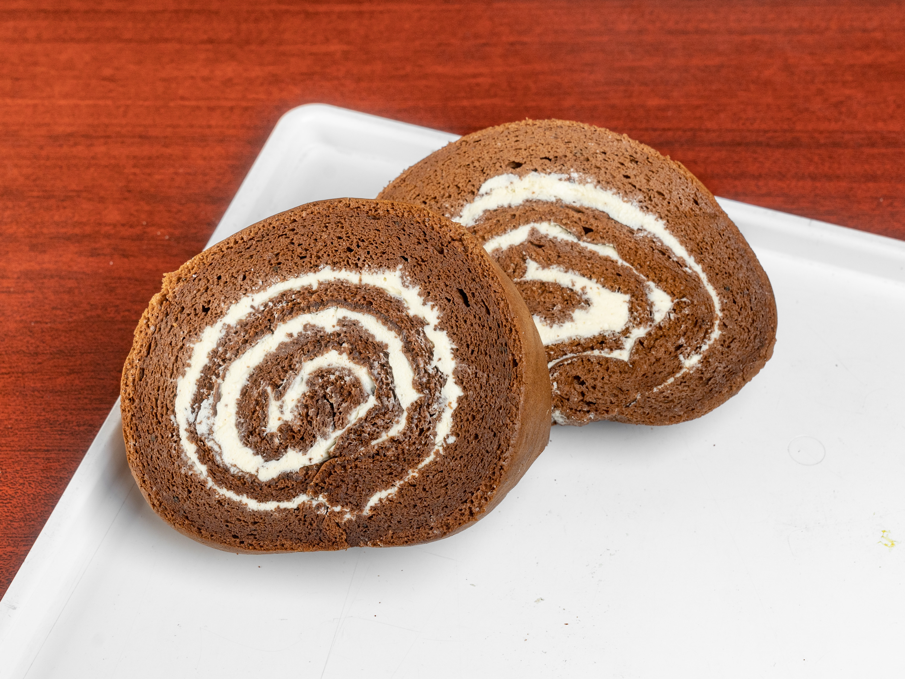 Order 2 Slice of Chocolate Swiss Roll food online from Cherry Blossom Bakery store, San Francisco on bringmethat.com