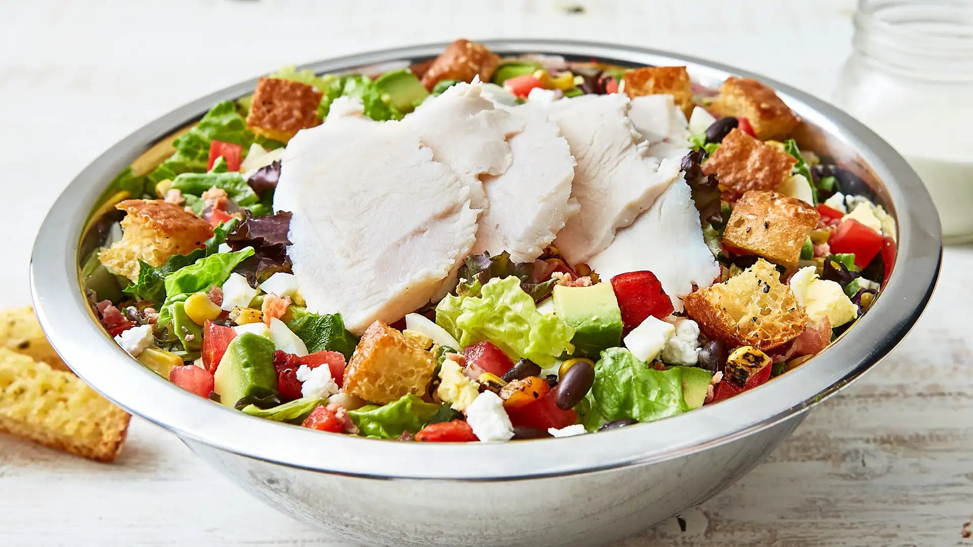 Order Turkey & Avocado Cobb Salad - Regular food online from Schlotzsky store, Lockhart on bringmethat.com
