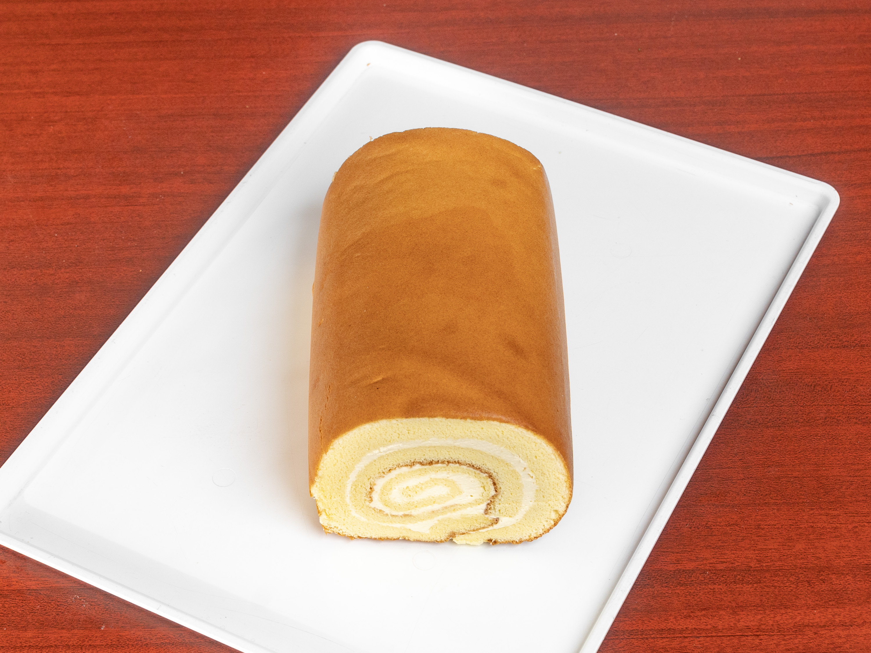 Order Whole Cream Swiss Roll food online from Cherry Blossom Bakery store, San Francisco on bringmethat.com