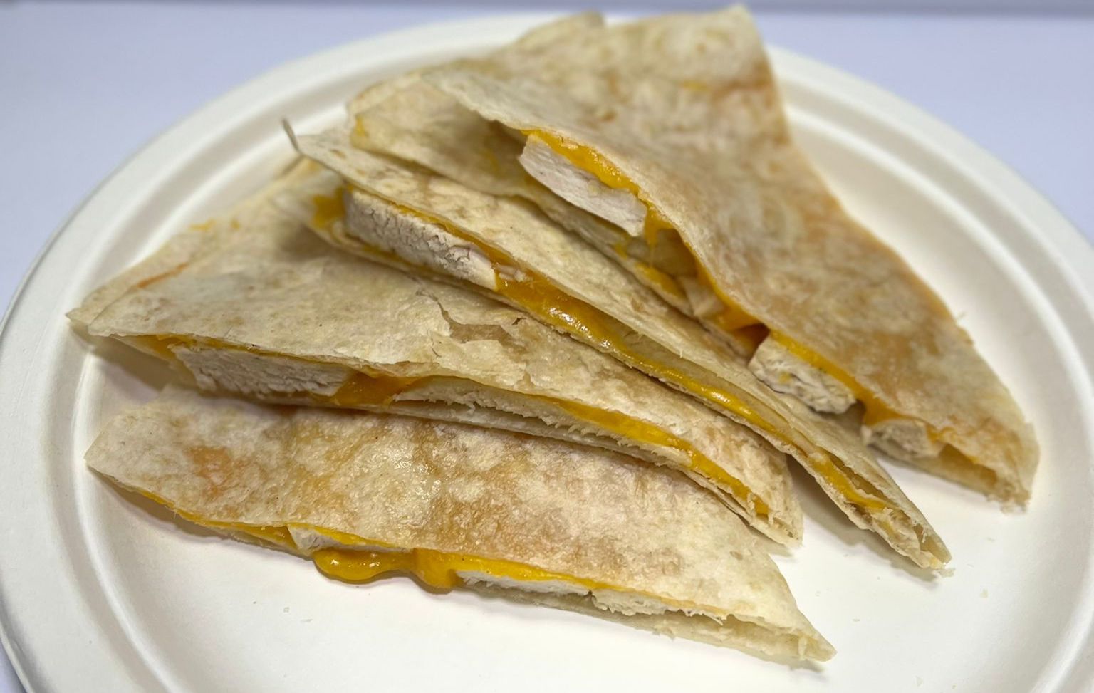 Order Chicken Quesadilla with French Fries food online from Fresh Millions Restaurant store, Gilbert on bringmethat.com