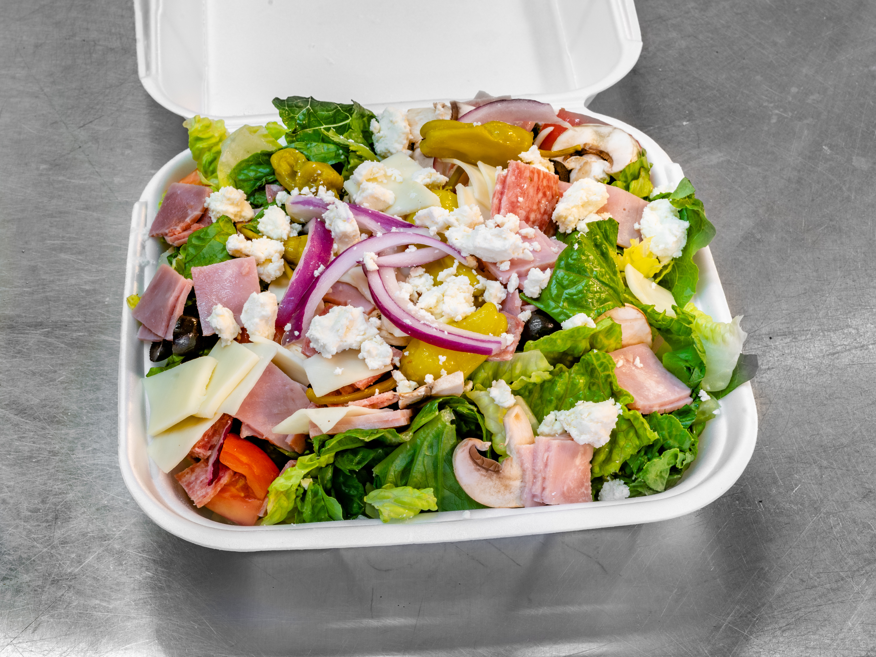 Order Antipasto Salad food online from Tony's Pizza store, Whittier on bringmethat.com