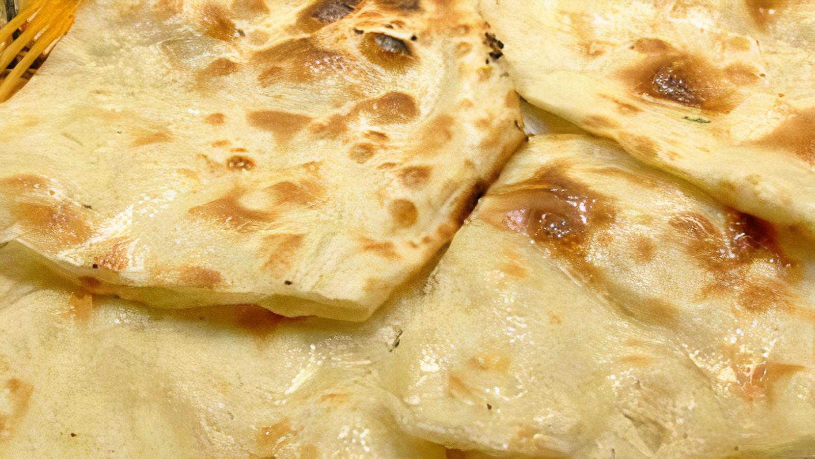 Order Butter Naan food online from Urban Momo store, San Francisco on bringmethat.com