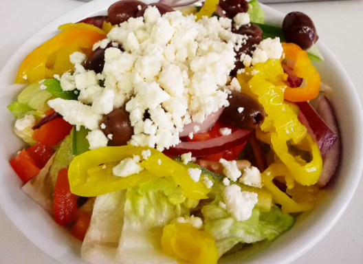 Order Famous Greek Salad  food online from Brooklyn Pie Co. store, Round Rock on bringmethat.com