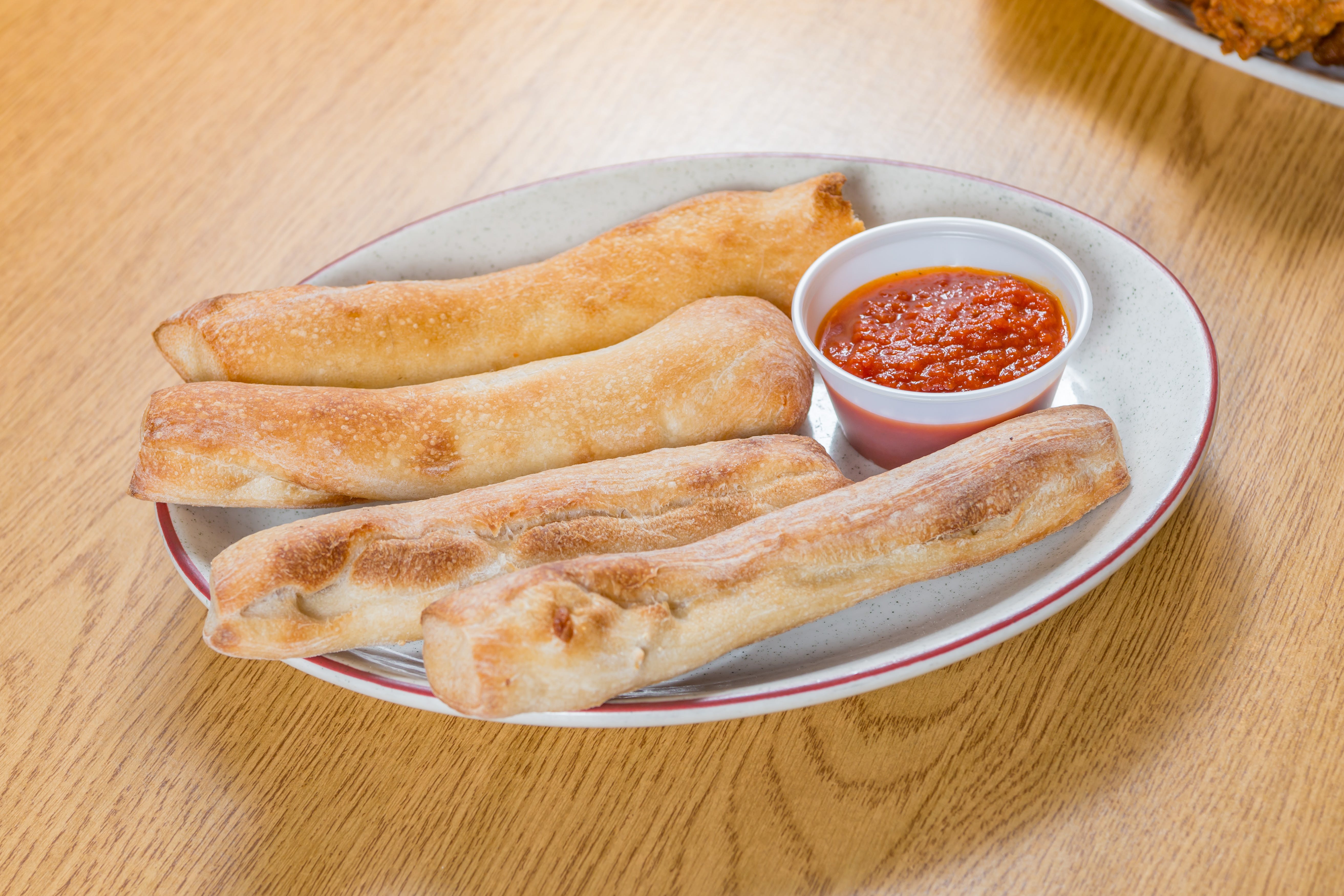 Order Breadsticks - 5 Pieces food online from Andre's Pizza store, Oxford on bringmethat.com