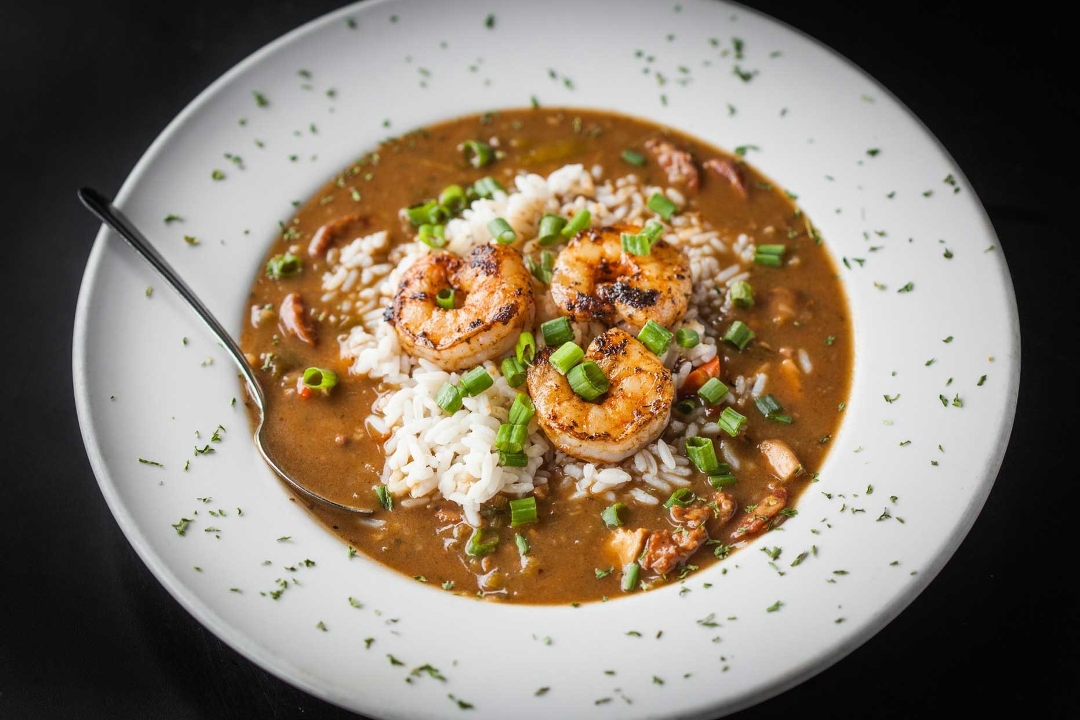 Order Gumbo Bowl food online from Free Man Cajun Cafe store, Dallas on bringmethat.com