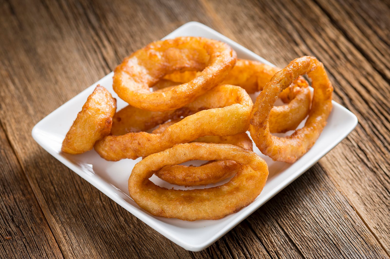 Order Onion Rings - Appetizer food online from Rosati's  store, Peoria on bringmethat.com