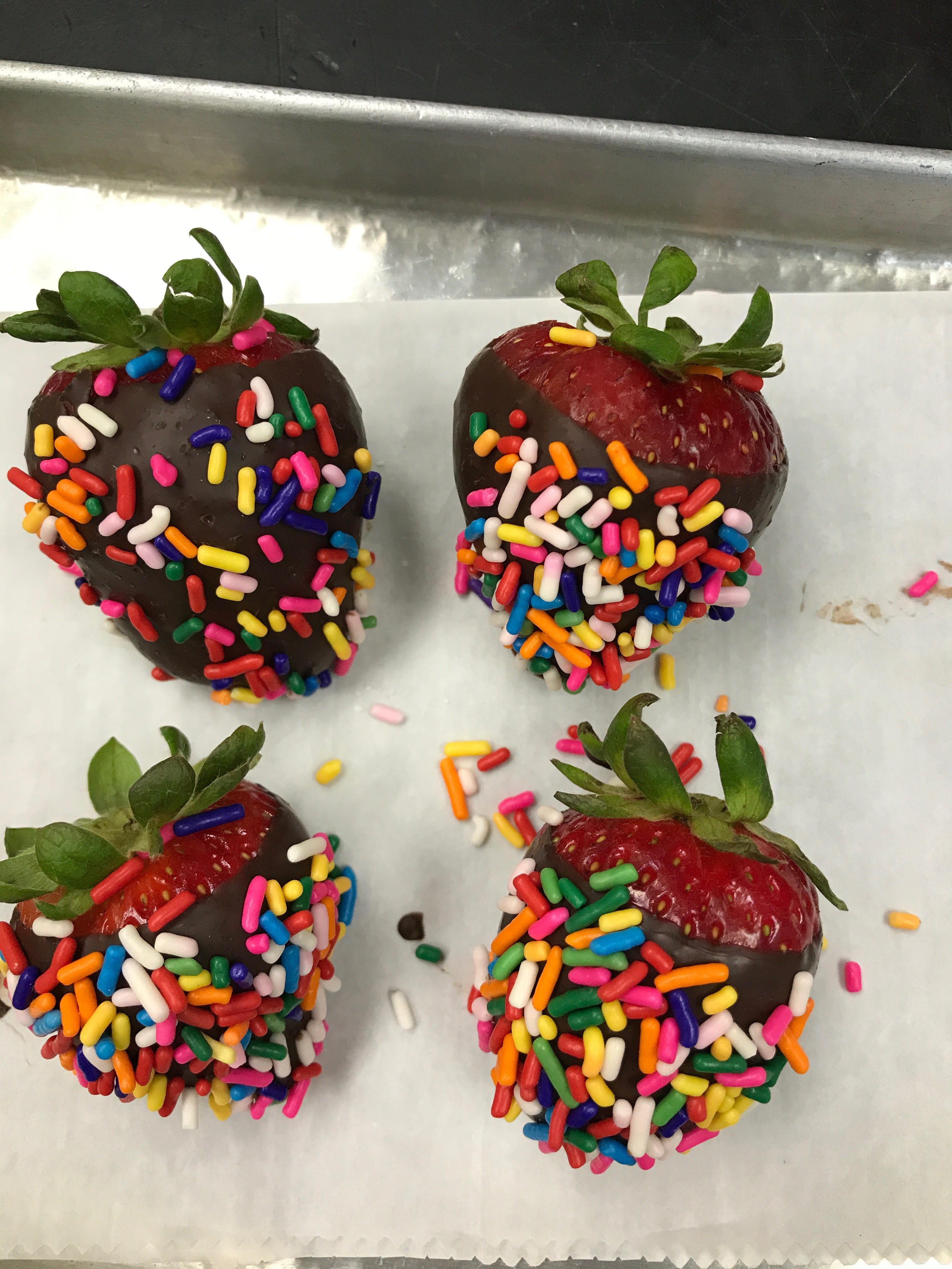 Order 4 Ct- Rainbow Sprinkle Chocolate dipped strawberries! food online from Menchie Frozen Yogurt store, League City on bringmethat.com