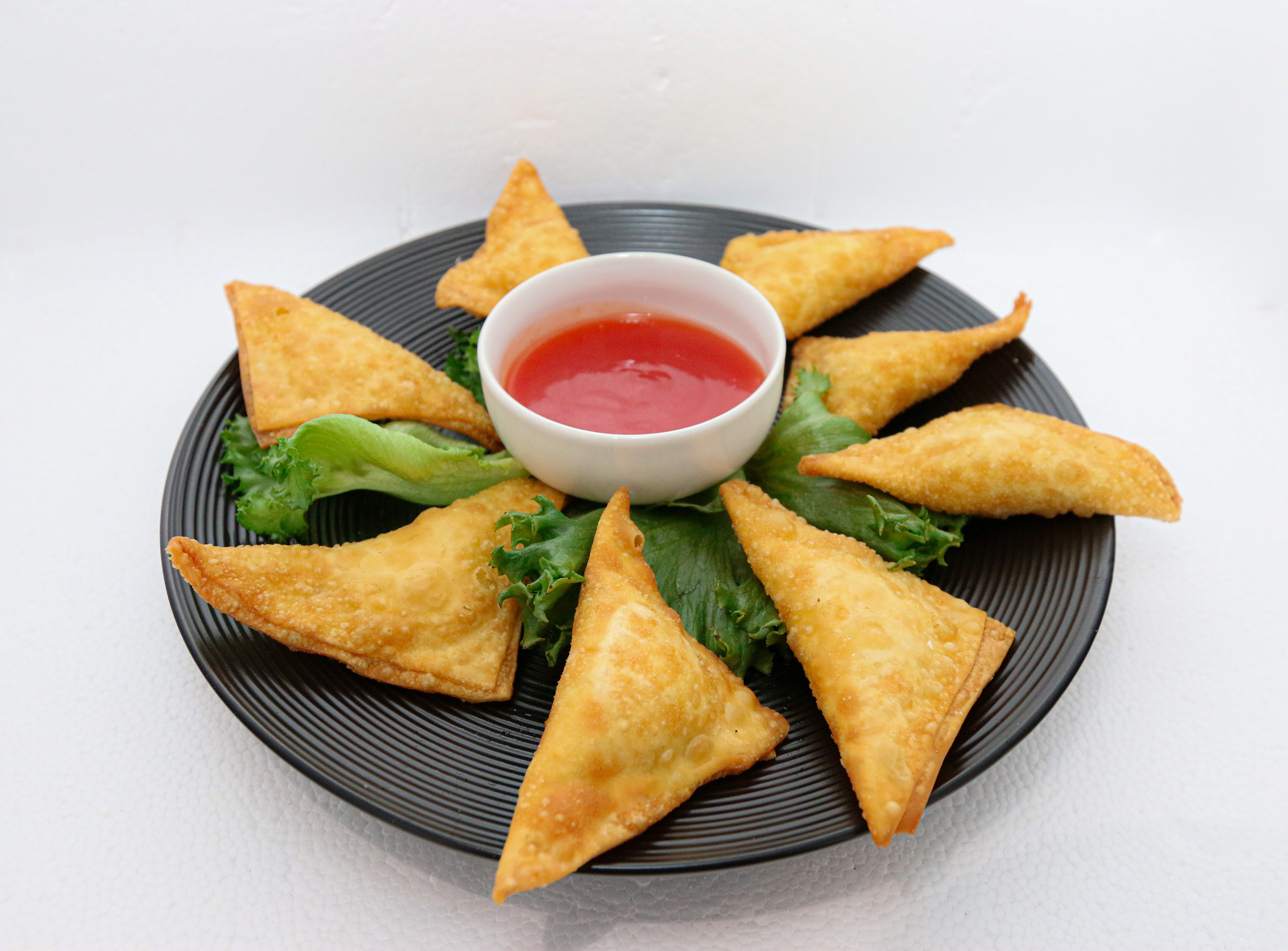 Order Crab Rangoon food online from Chopstick store, Cleveland on bringmethat.com