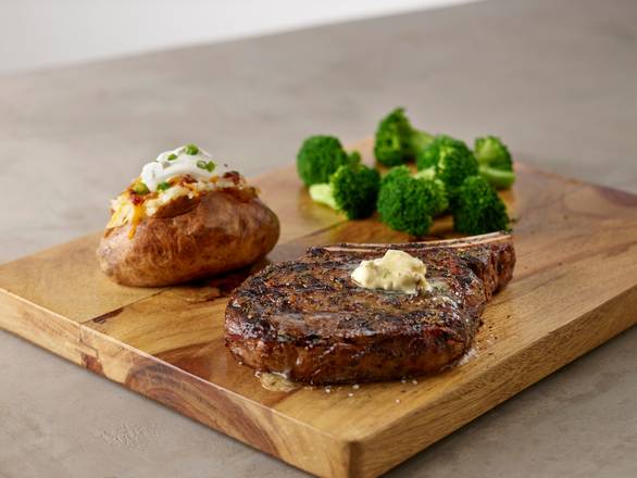 Order Bone-In Ribeye food online from Smokey Bones Barbeque & Grill store, Cranberry Township on bringmethat.com