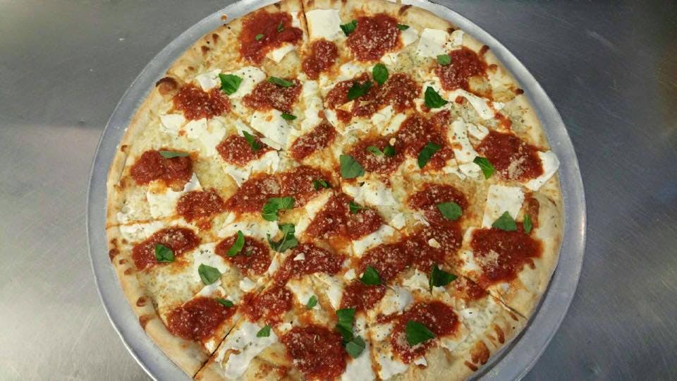Order Margherita Pizza - Small 14'' (6 Slices) food online from Manhattan Express Pizza store, Amsterdam on bringmethat.com