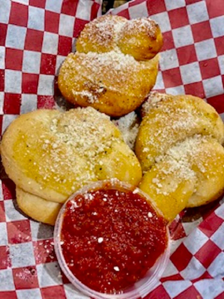 Order Garlic Knots - Appetizer food online from Rico's Pizza store, Los Banos on bringmethat.com