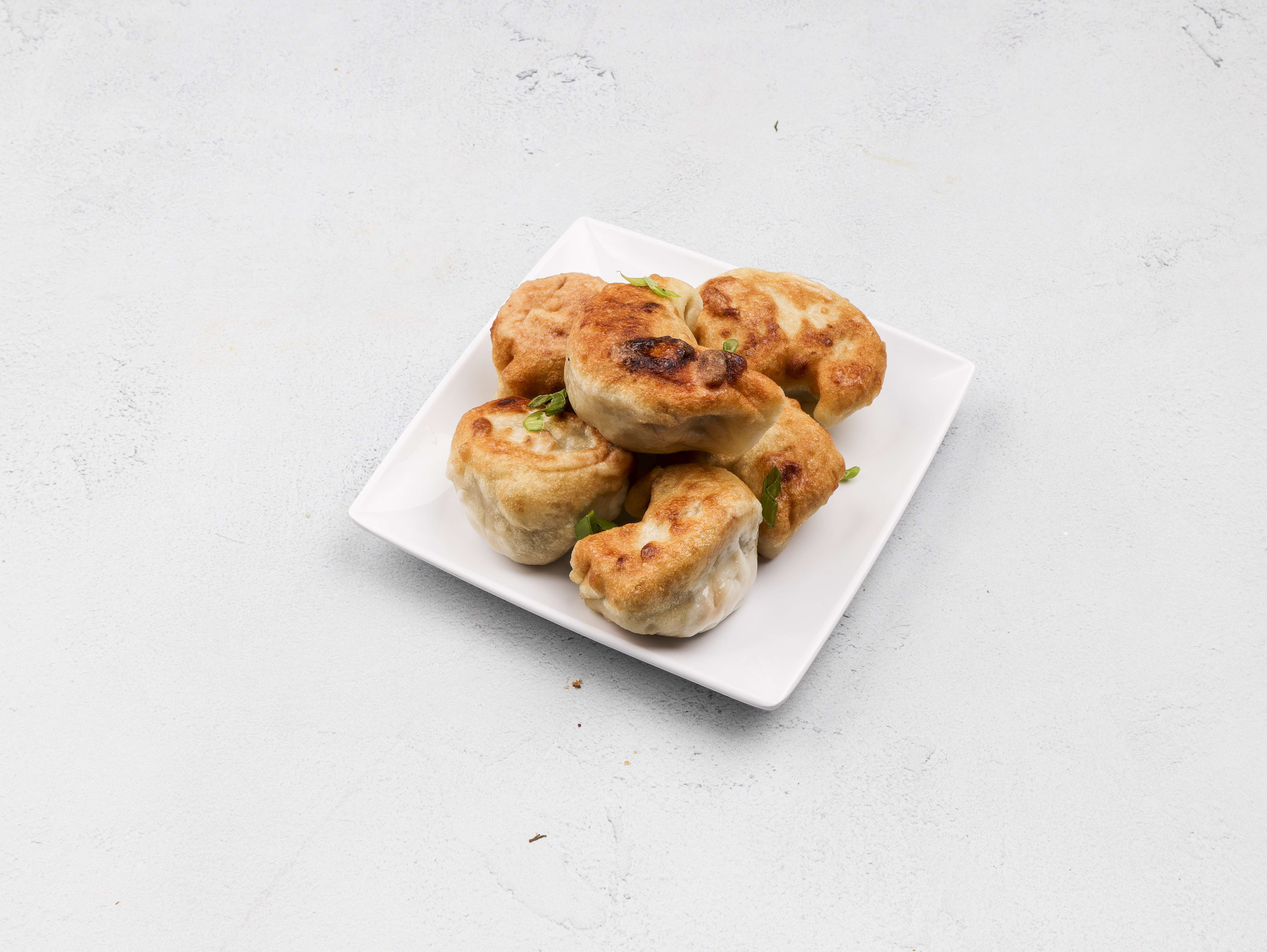 Order 8. Six Piece Fried Dumpling food online from Chang Jiang store, Madison on bringmethat.com