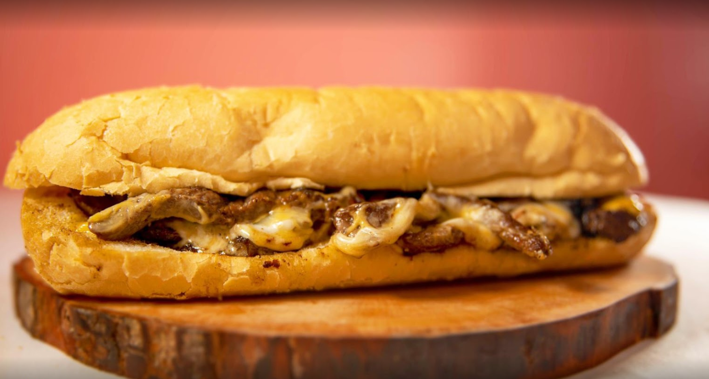 Order American Philly Cheesesteak Sub food online from Fat Cheesesteaks store, Flushing on bringmethat.com