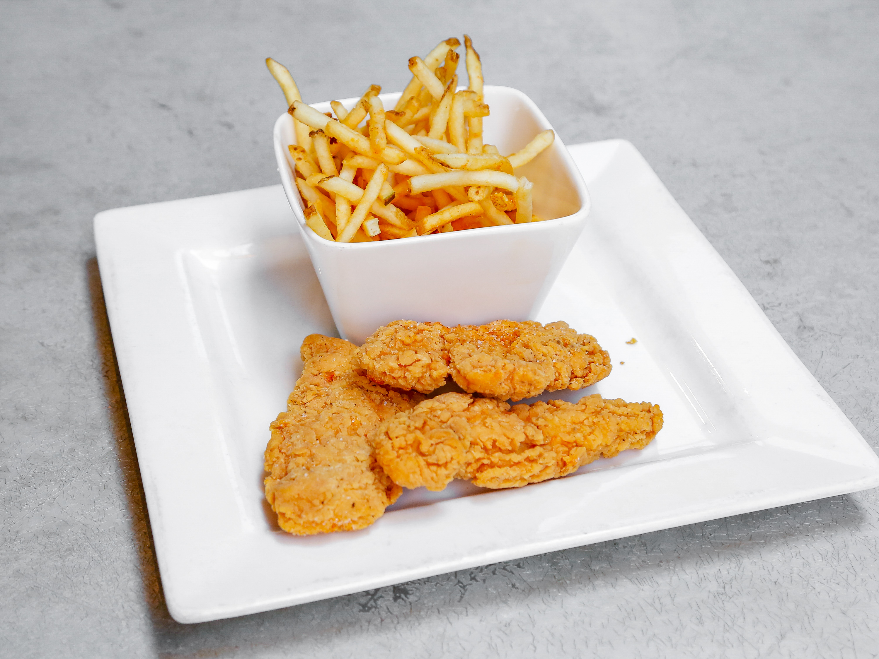 Order Kids Chicken Tenders and Fries food online from Bistro 7 store, Reno on bringmethat.com