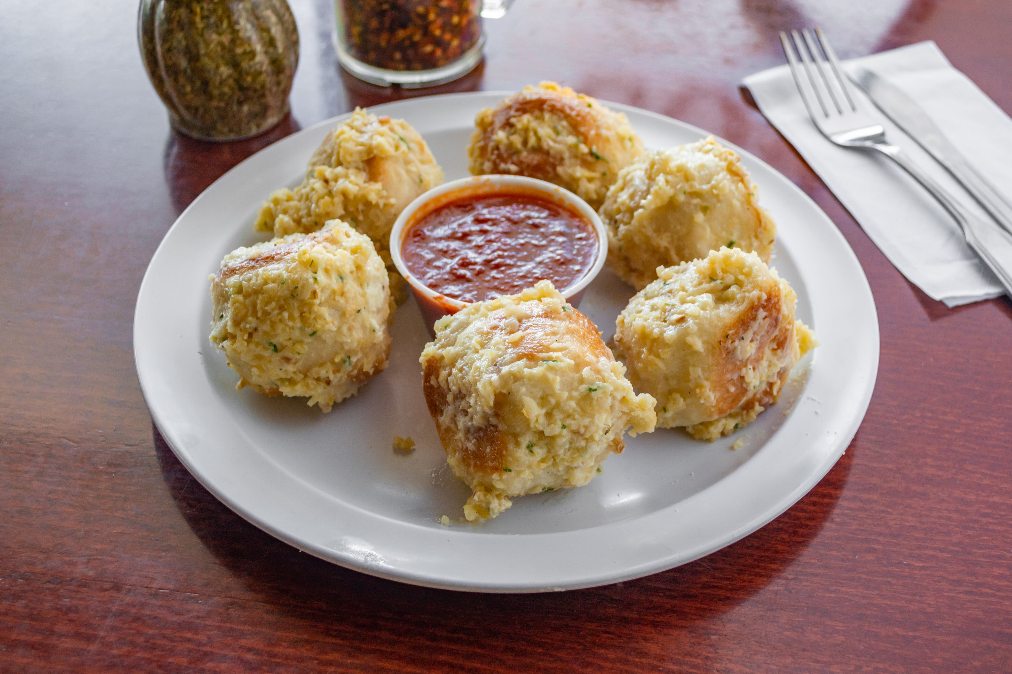 Order Garlic Knots - 6 Pieces food online from Tuscana Pizza & Pasta store, Nazareth on bringmethat.com