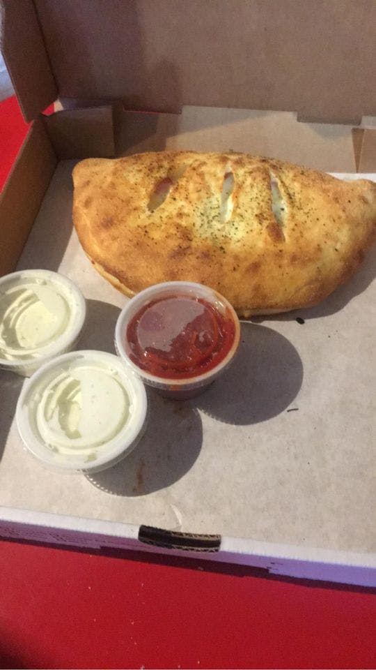 Order Calzone - Calzone food online from Fatty'z Pizza store, Mountain Home on bringmethat.com