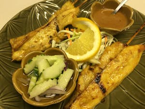 Order 6. Chicken Satay food online from Sawasdee Thai Cuisine store, San Antonio on bringmethat.com