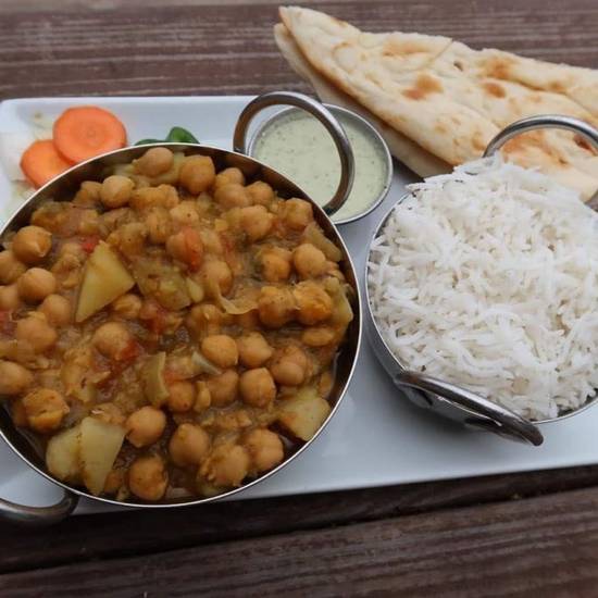 Order Chana Masala food online from Cowboys & Indians Tex-In Kitchen store, Houston on bringmethat.com