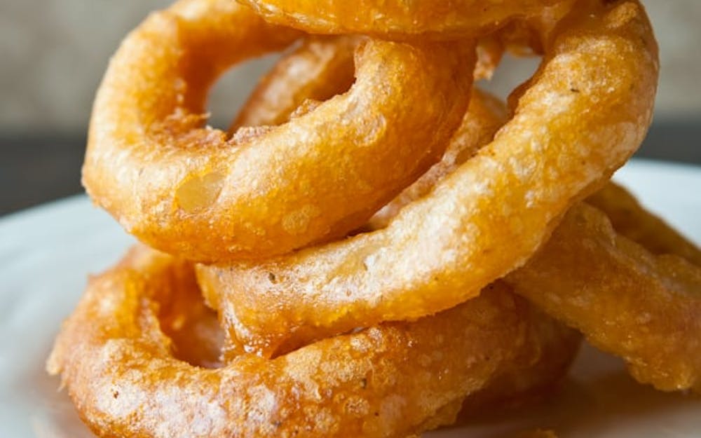 Order Onion Rings food online from Branco's Pizza store, Medford on bringmethat.com