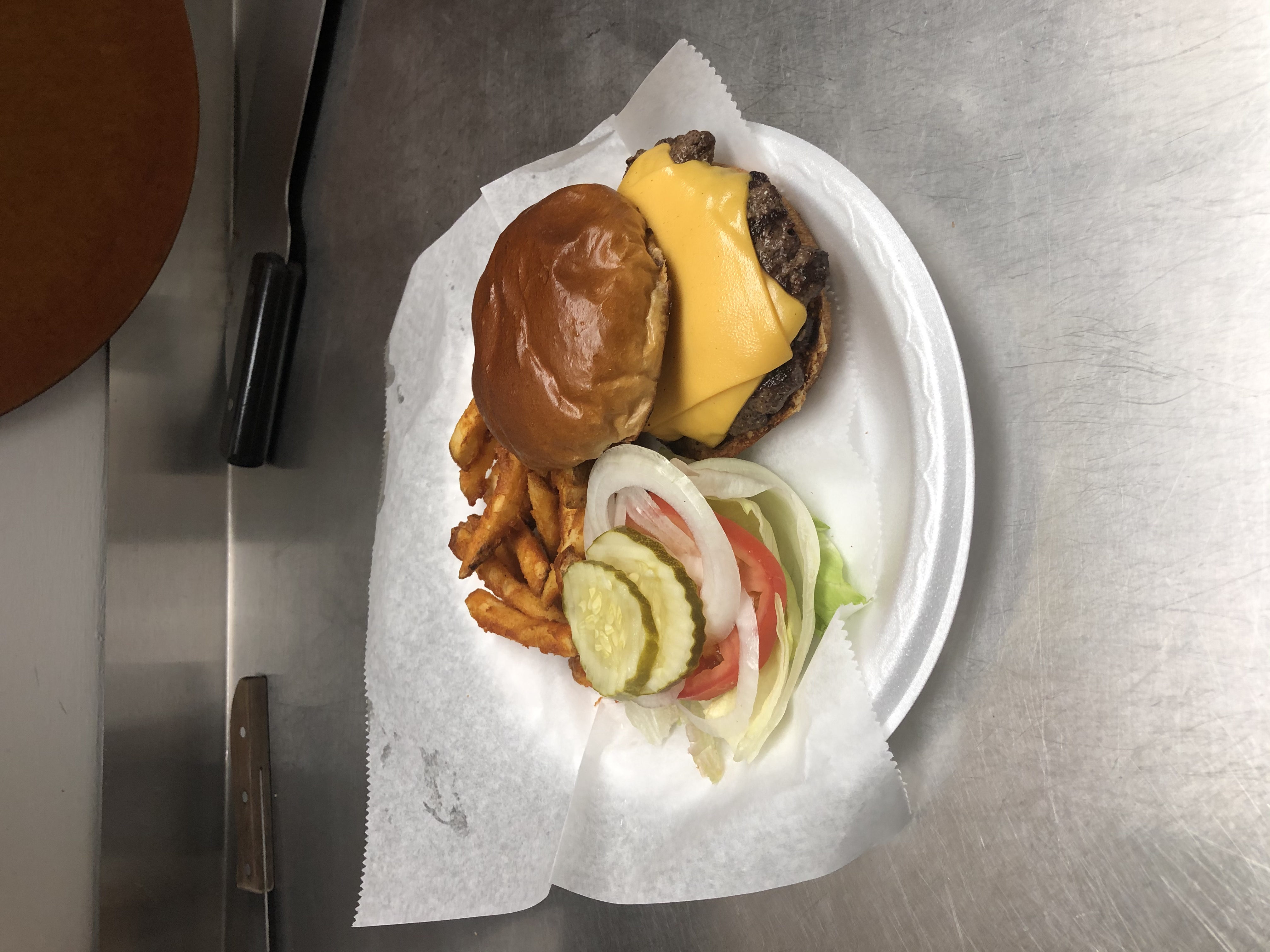 Order 1/3 lb. Cheeseburger food online from The Station Pizzeria store, Glenwood on bringmethat.com
