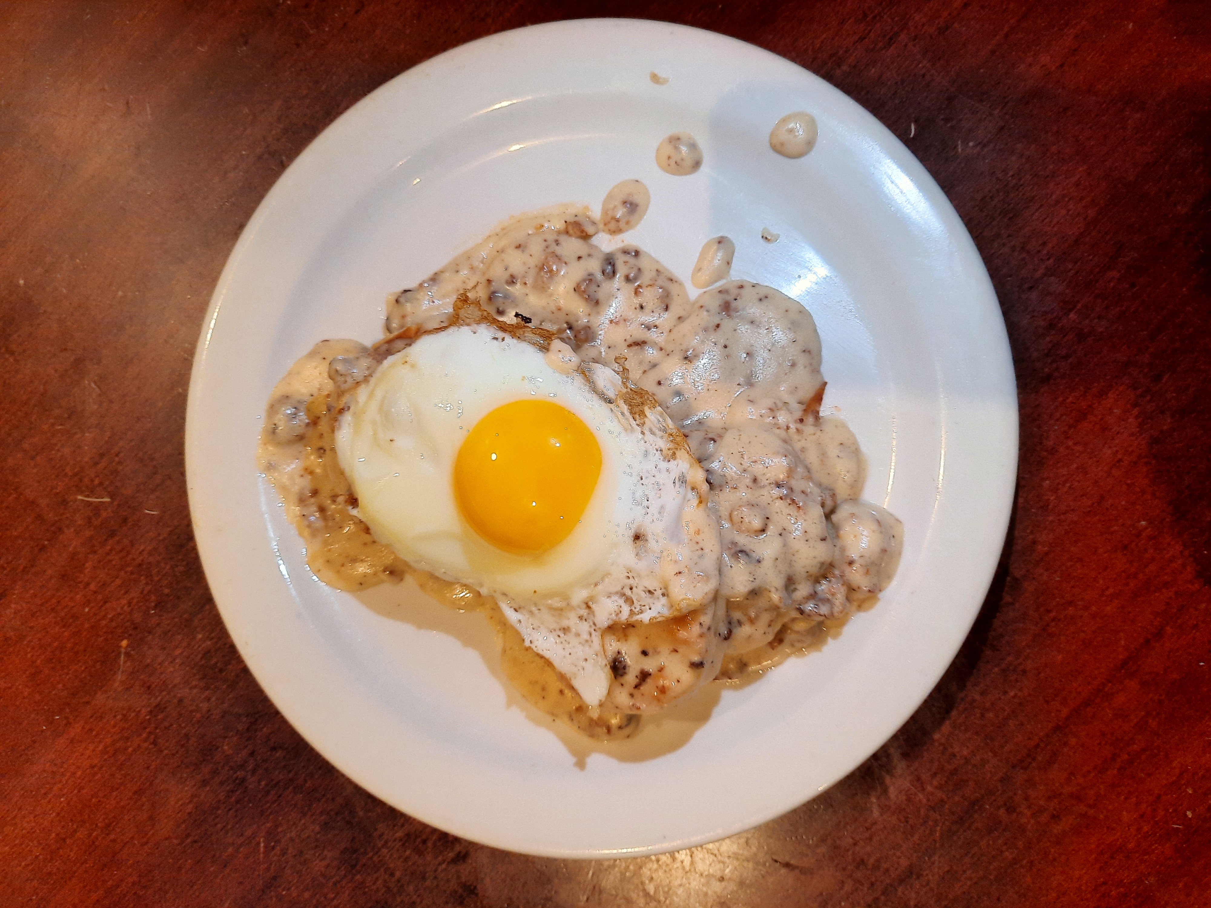 Order Bisquits w sausage gravy and fried egg food online from Galaxy Diner store, New York on bringmethat.com