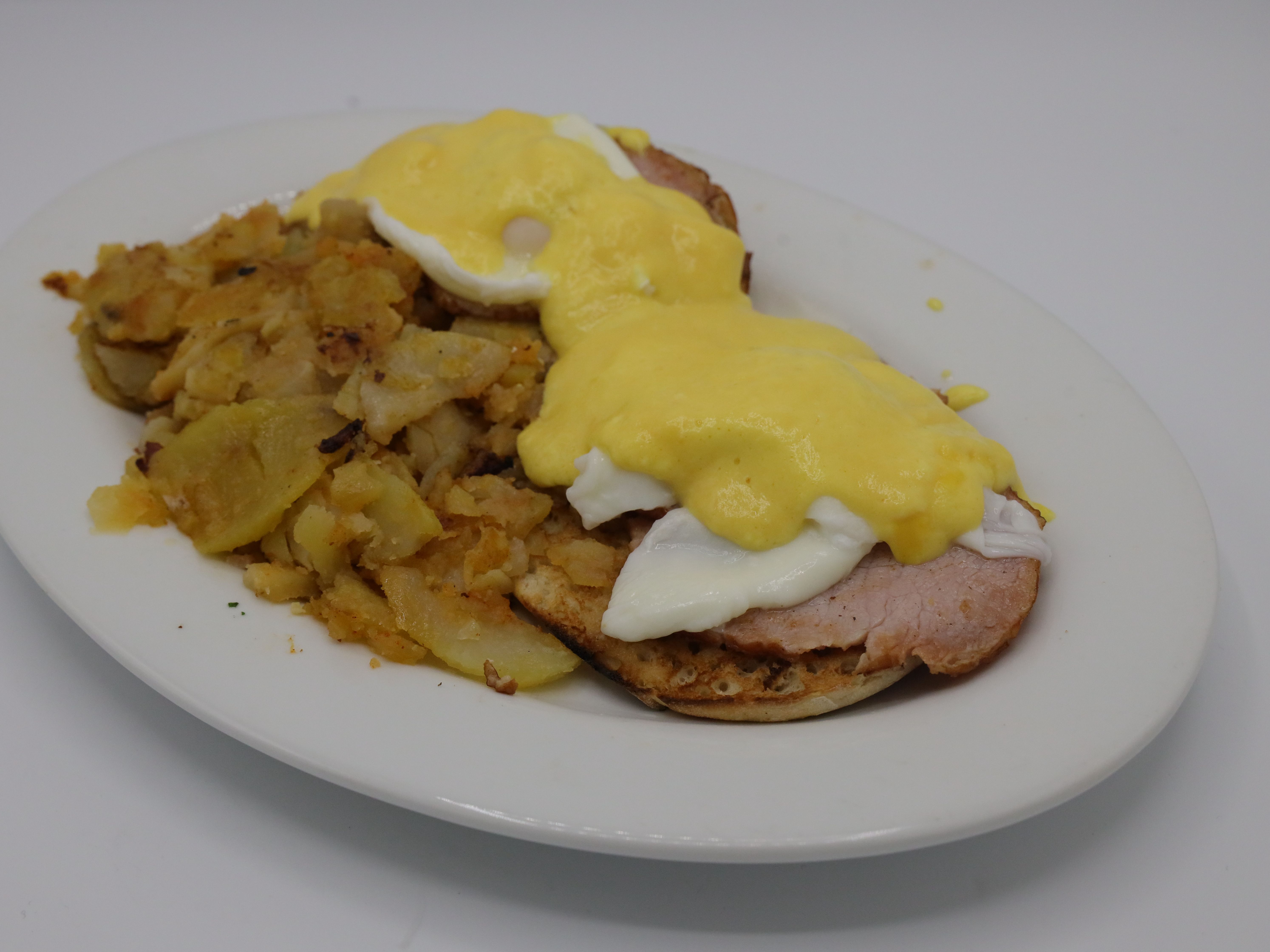 Order Eggs Benedict food online from Montclair House Grill store, Montclair on bringmethat.com