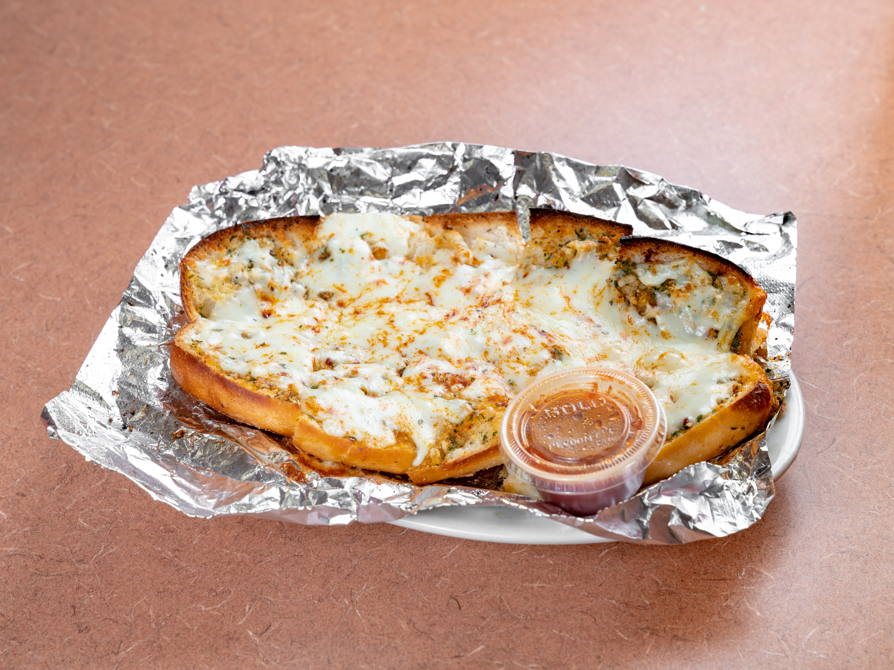 Order Garlic Bread with Melted Mozzarella food online from Ancona store, Valley Stream on bringmethat.com