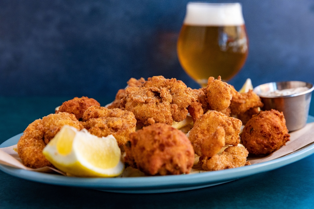 Order Cajun Shrimp and Hushpuppy Basket food online from The Social List store, Long Beach on bringmethat.com