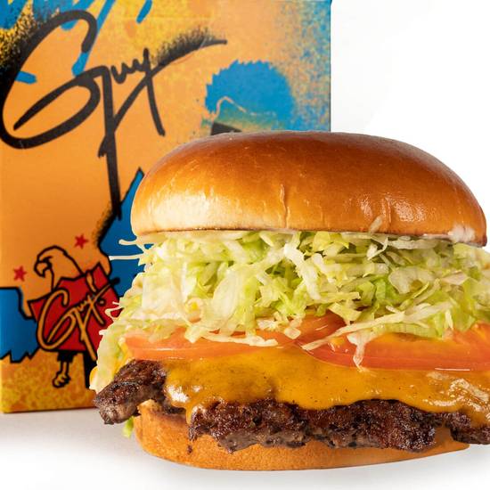 Order Real Cheezy Burger food online from Guy Fieri's Flavortown Kitchen store, Detroit on bringmethat.com