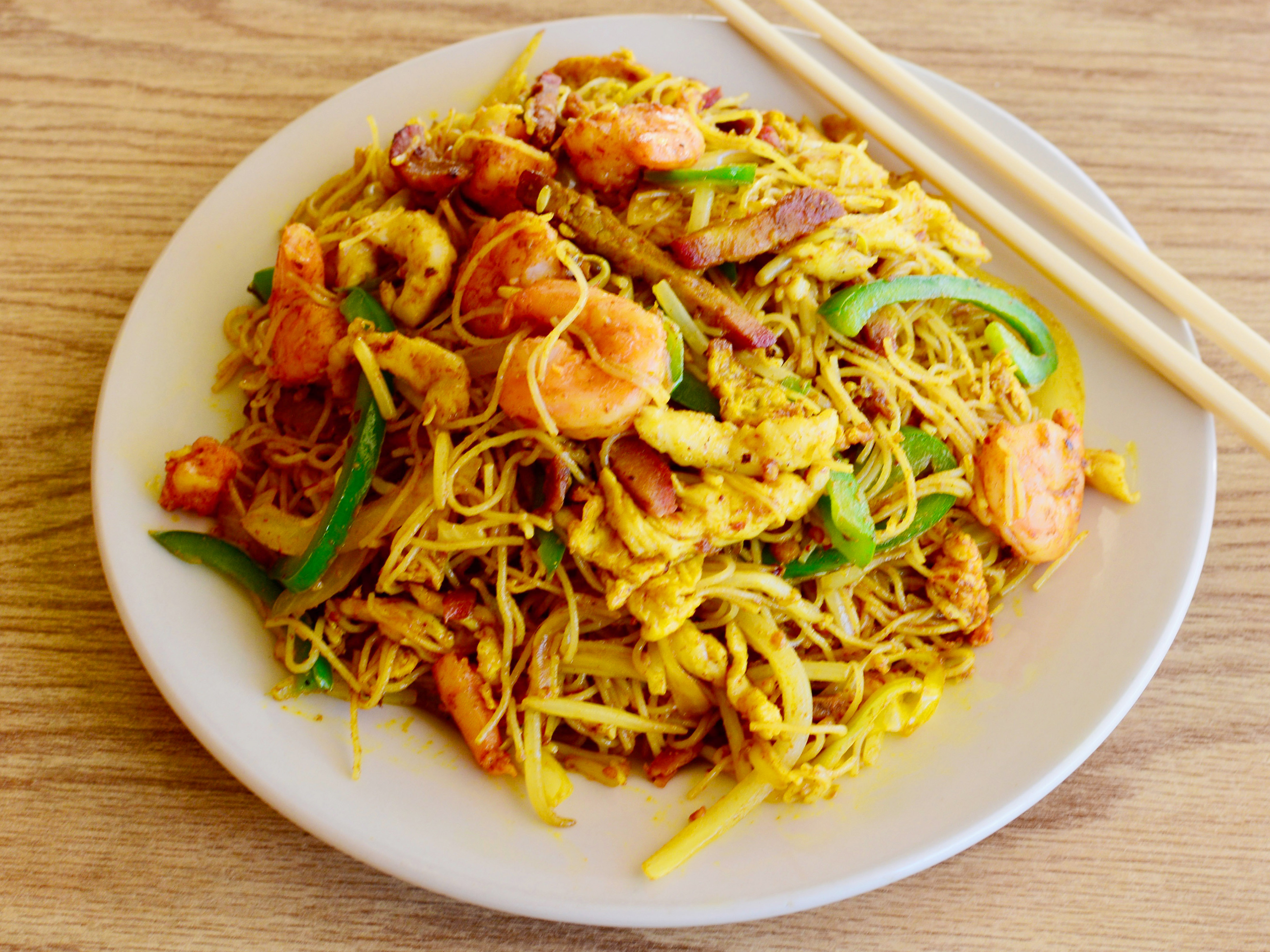 Order Singapore Rice Noodle food online from Panda Bowl Restaurant store, Arlington on bringmethat.com