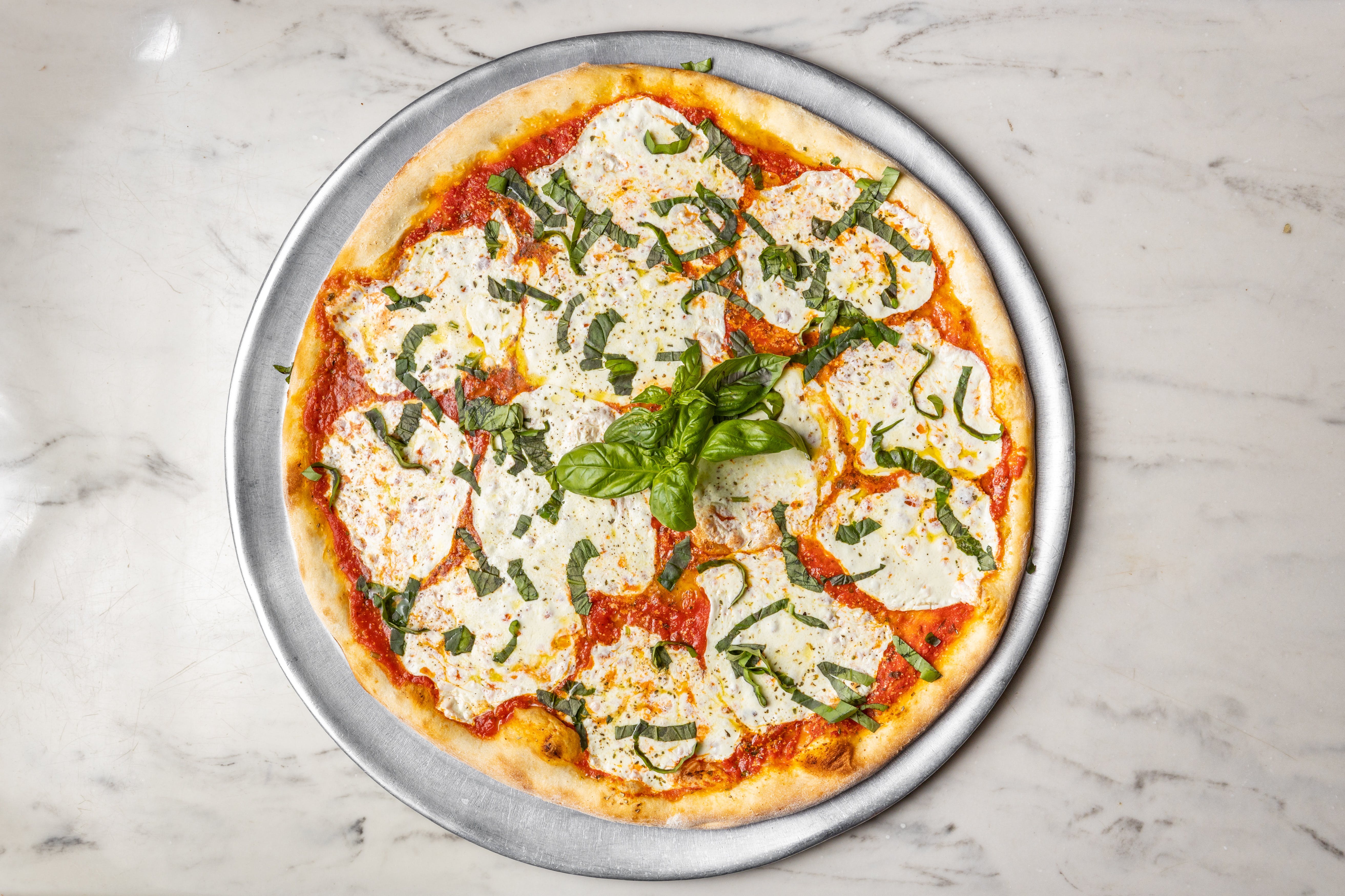 Order Margherita Pizza - Regular food online from Graziella Pizza store, Flushing on bringmethat.com