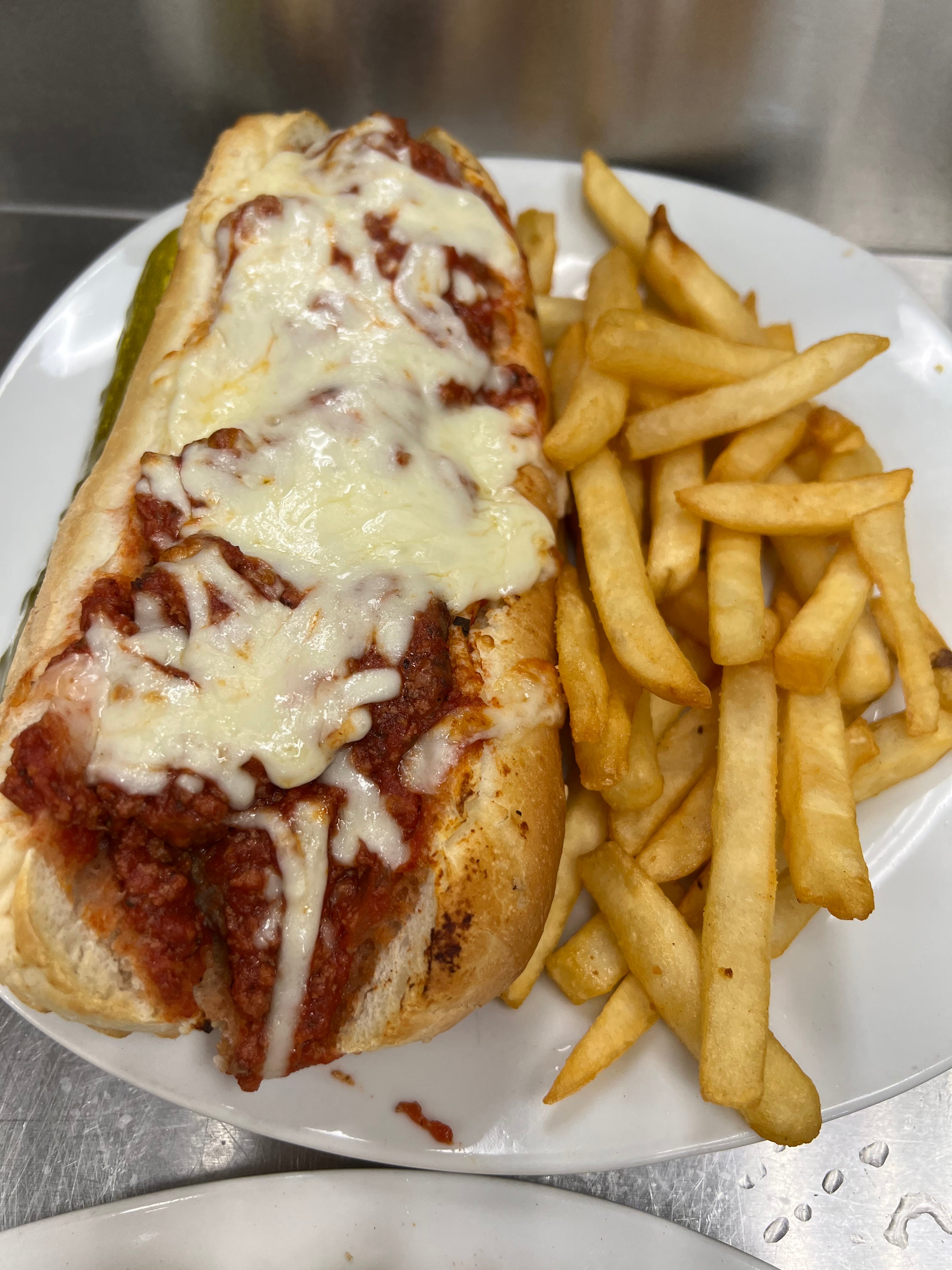 Order Homemade Meatball Sub - Homemade Meatball Sub food online from Pizza Mia store, Grand Blanc on bringmethat.com