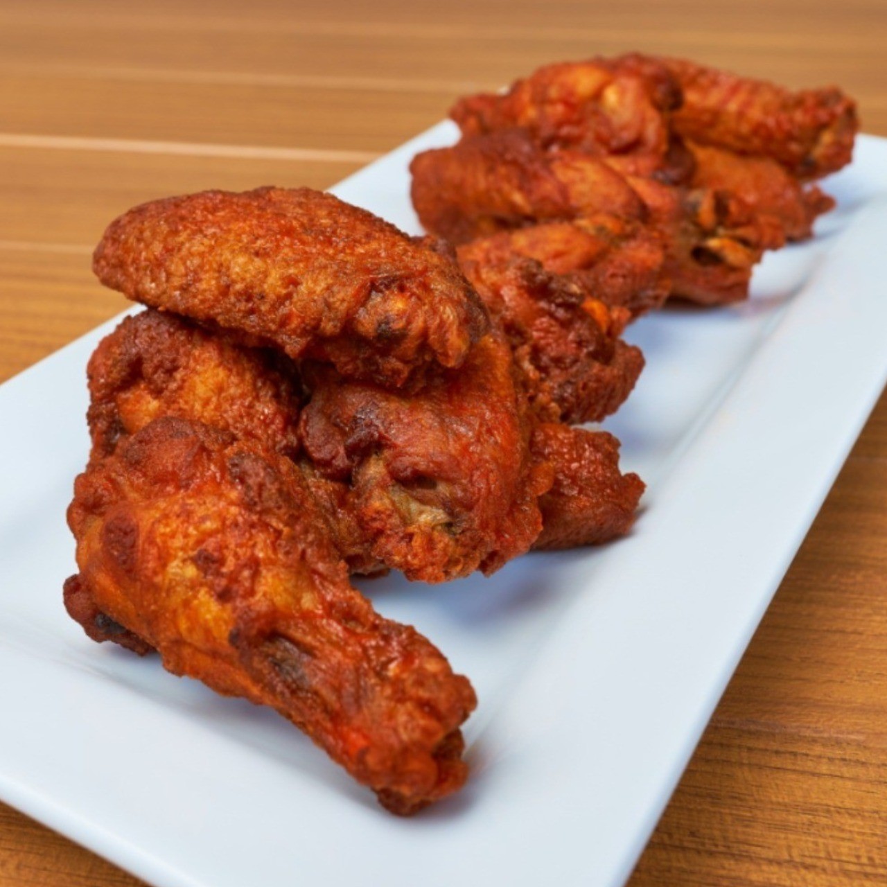 Order Wings food online from Jimmy E Bar + Grill store, Signal Hill on bringmethat.com