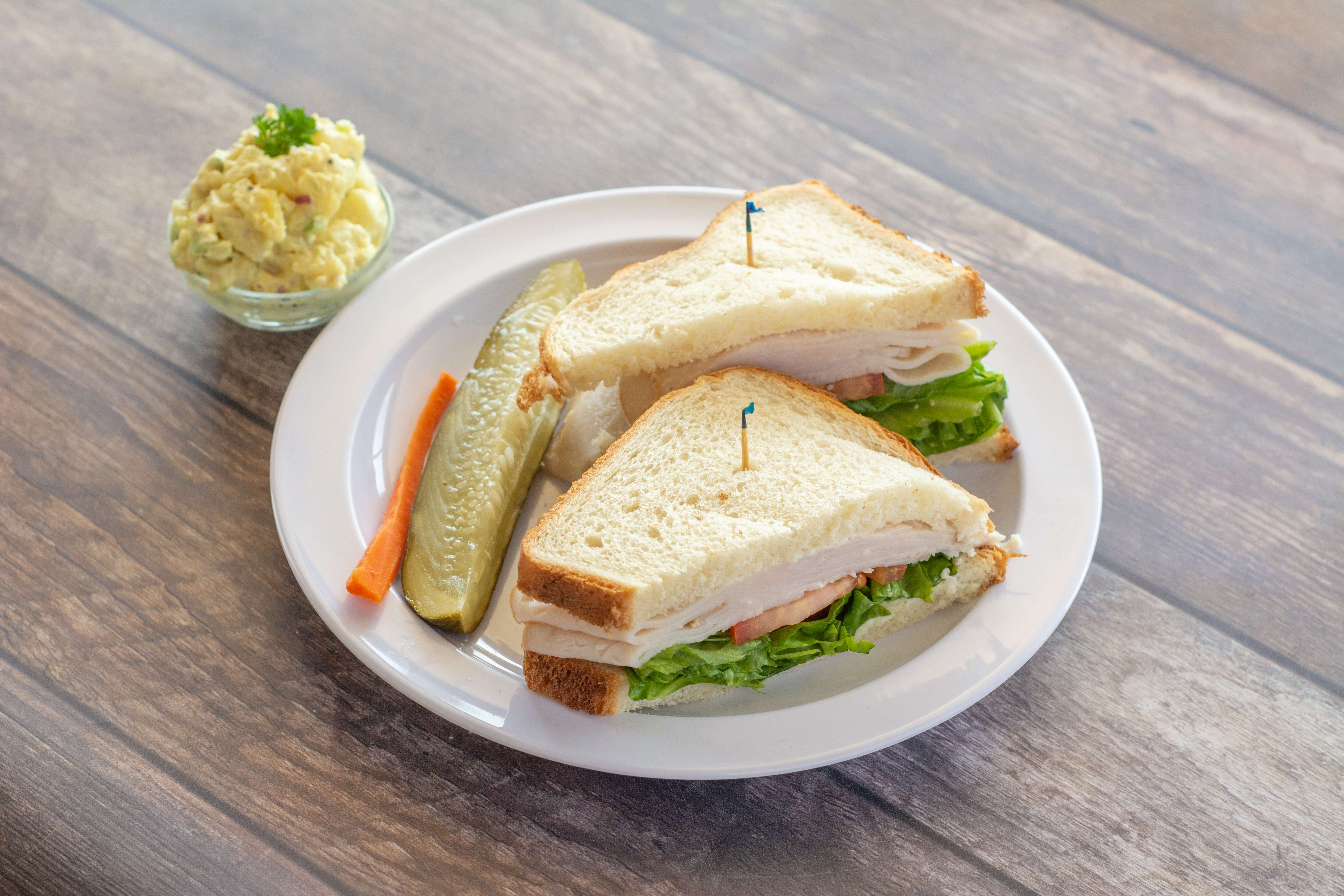 Order Turkey Sandwich food online from Omelette Inn Cafe store, Huntington Beach on bringmethat.com