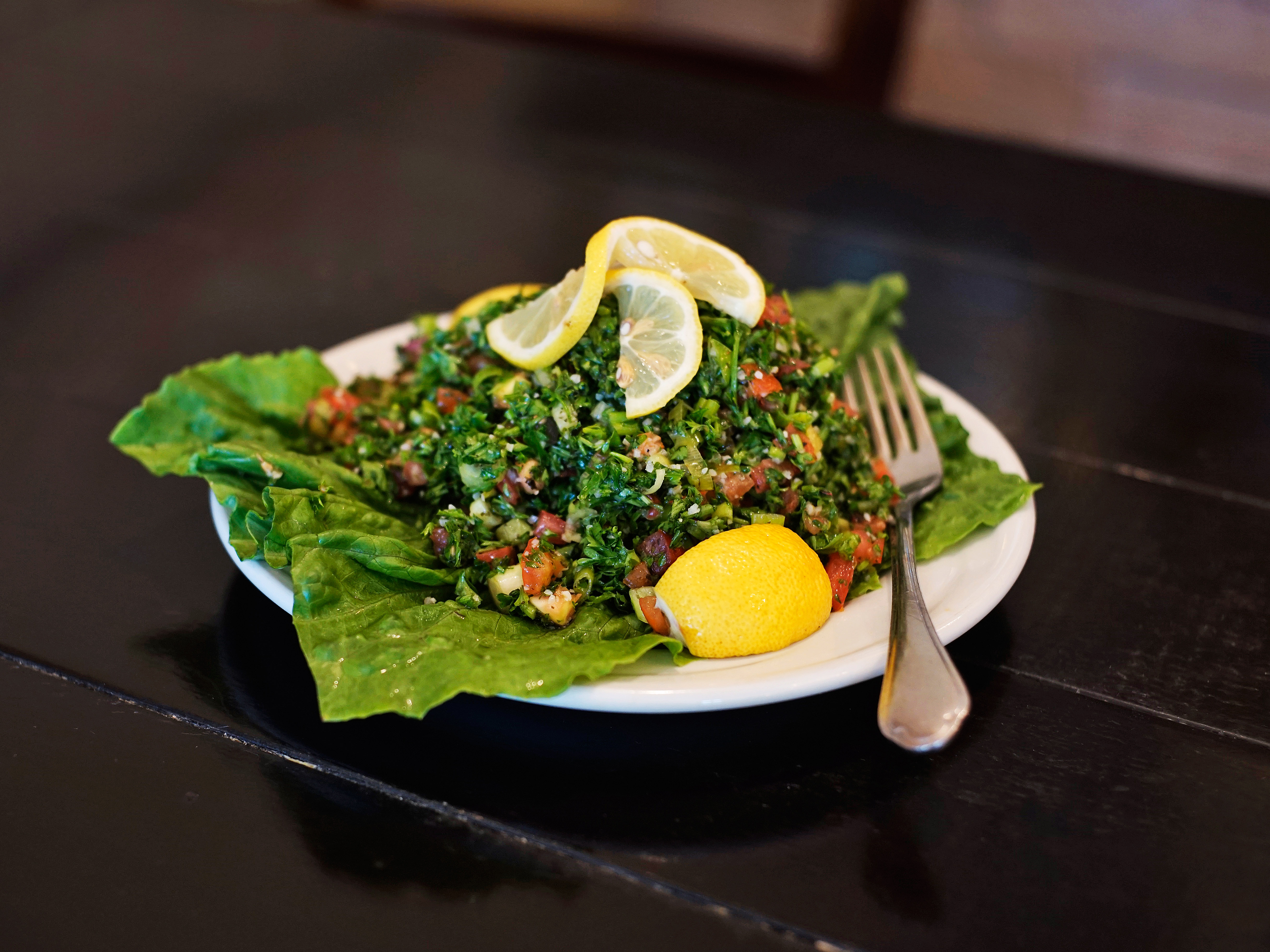 Order Tabouli Salad food online from Cedar Grille store, Troy on bringmethat.com