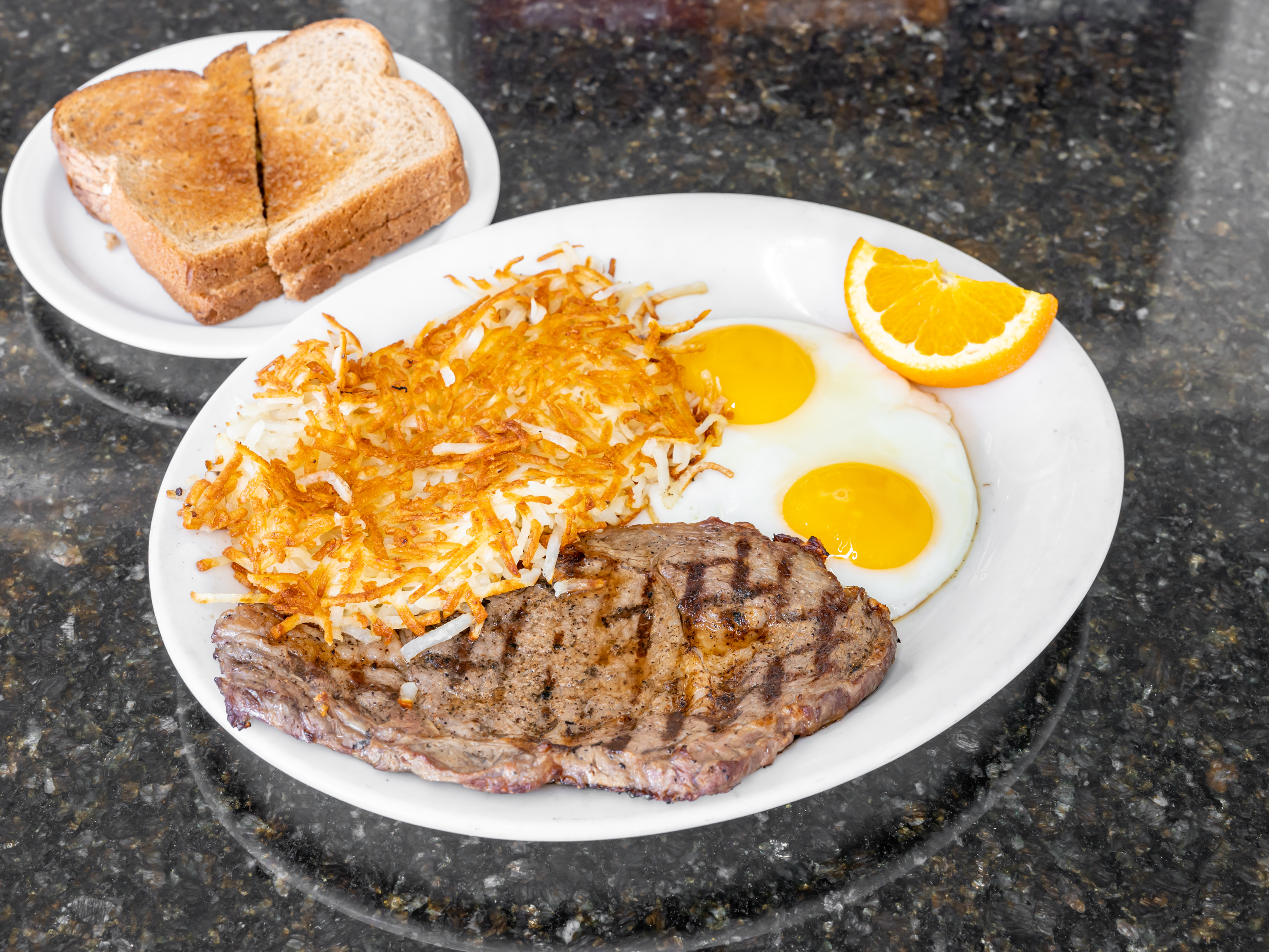 Order 8 oz. Ribeye (USDA PRIME) and Eggs Breakfast food online from Uncle Pete Cafe store, Westminster on bringmethat.com