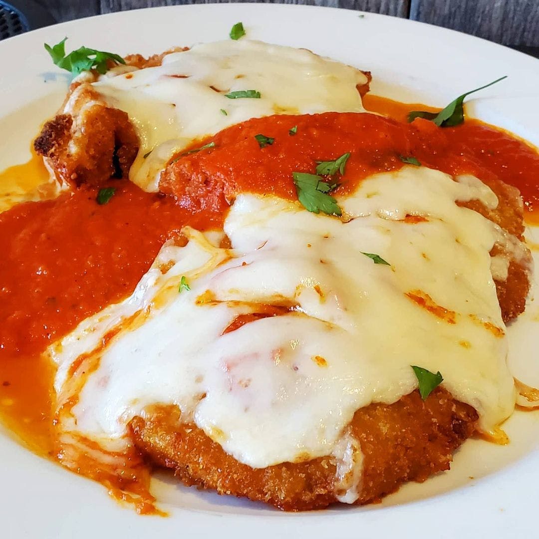 Order Chicken Parmigiana - Entree food online from Midland Ave Pizzeria store, Yonkers on bringmethat.com