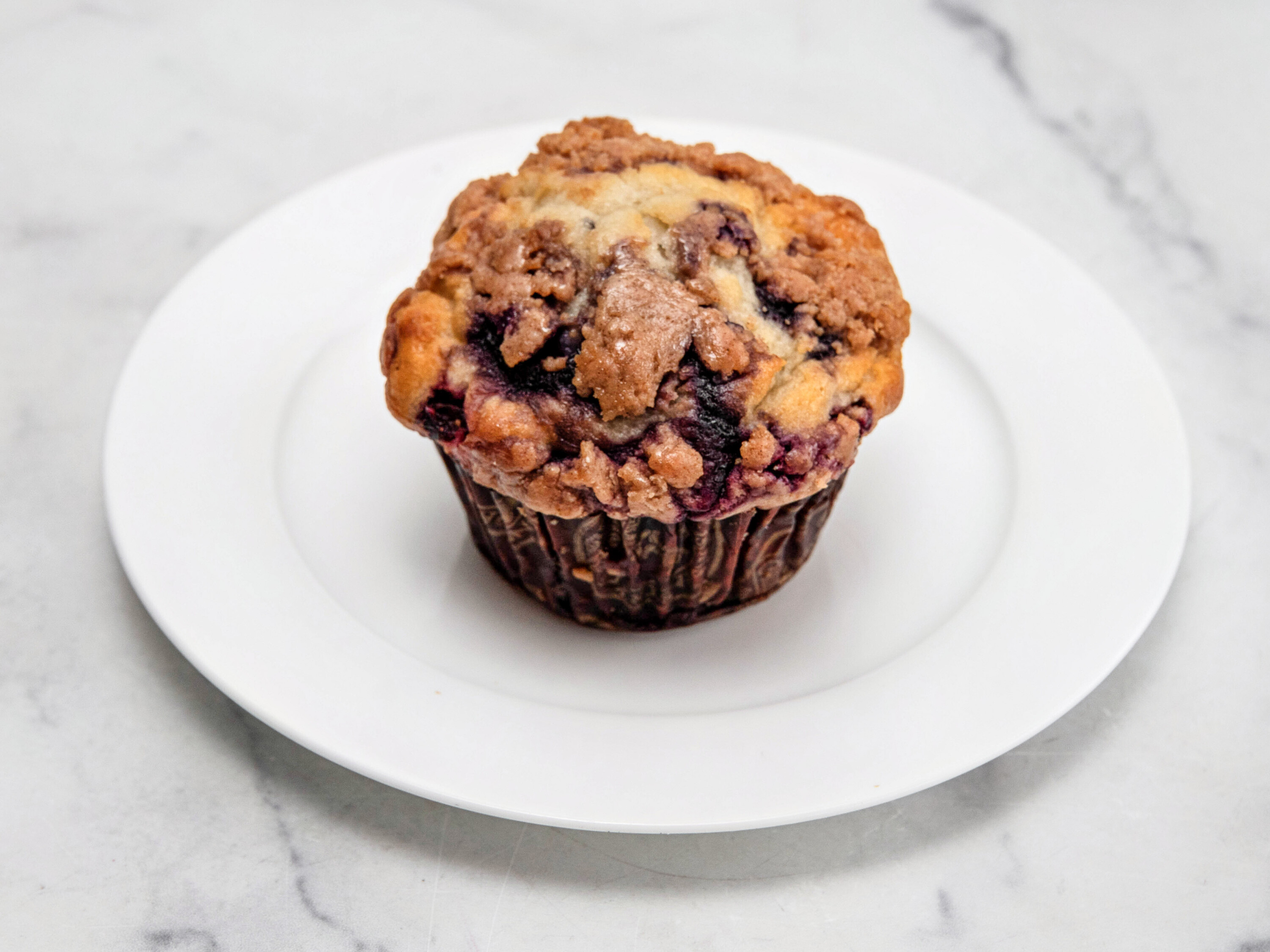 Order Blueberry Crumb Muffin food online from Bagel Express store, Valley Stream on bringmethat.com