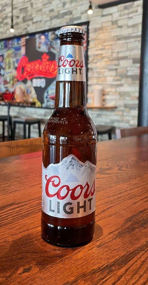 Order Coors Light, 12 oz bottle beer (4.2% ABV) food online from Cousin Barbq store, Crowley on bringmethat.com