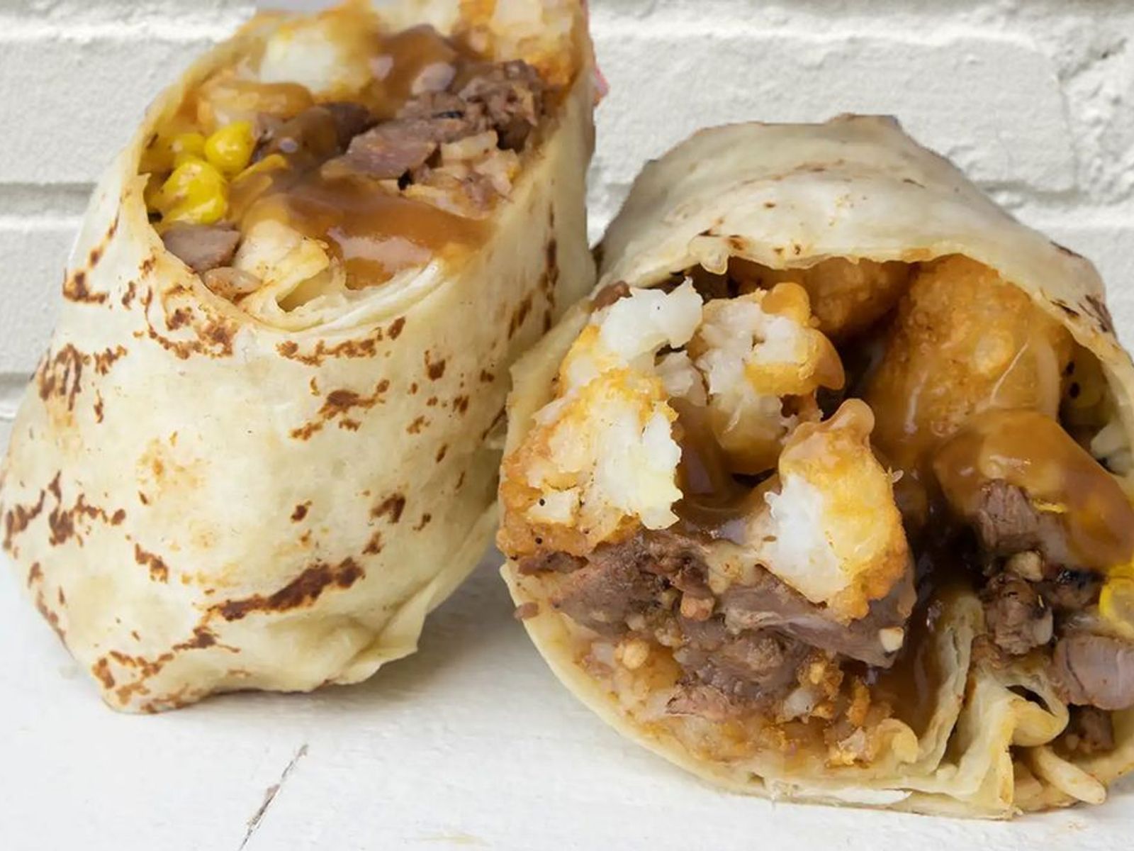 Order The Workin' Man Burrito - Steak +  Gravy food online from Seaside Burritos and Tacos store, Culver City on bringmethat.com