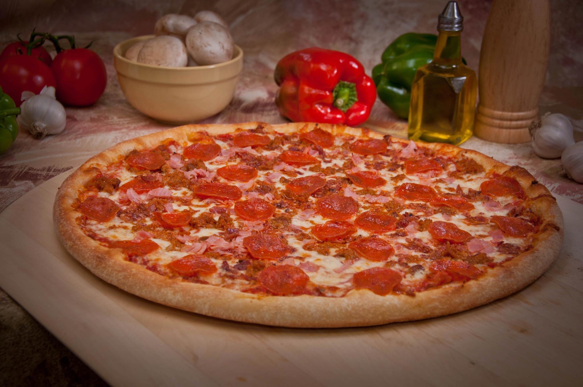 Order Meat Lovers Pizza food online from Original Italian Pizza store, Watertown on bringmethat.com