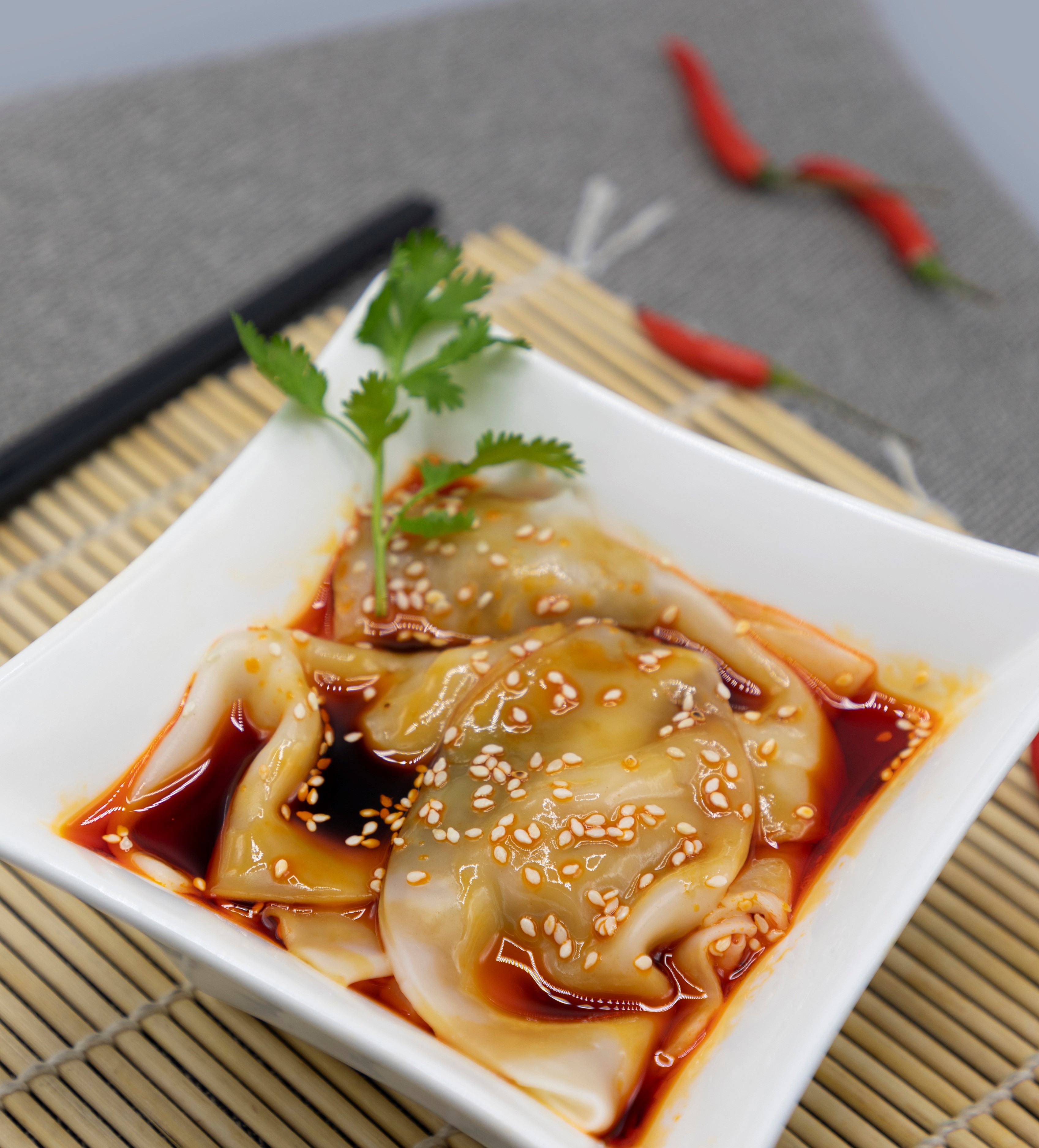Order D8. Sichuan Style Dumpling with Pork food online from Hui Restaurant & Bar store, New York on bringmethat.com