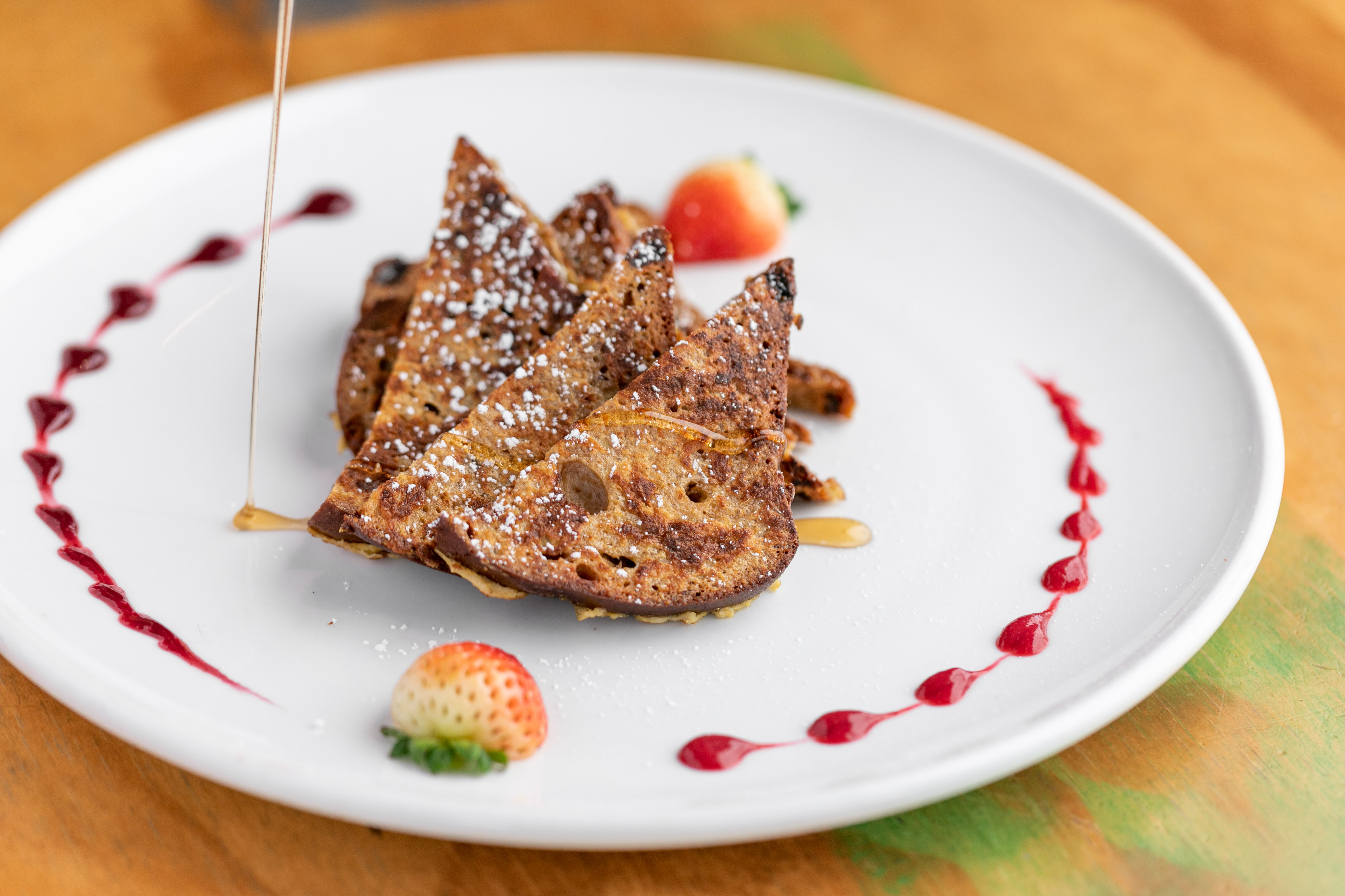 Order Gluten-Free Cinnamon Raisin French Toast food online from Swamis Cafe store, Solana Beach on bringmethat.com