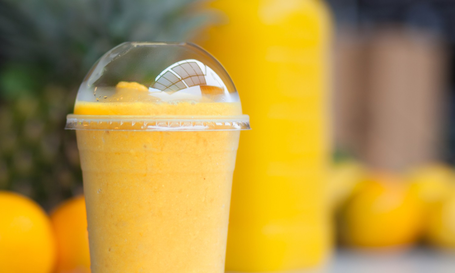 Order Tropical Mango Smoothie food online from Flavors Nyc store, New York on bringmethat.com