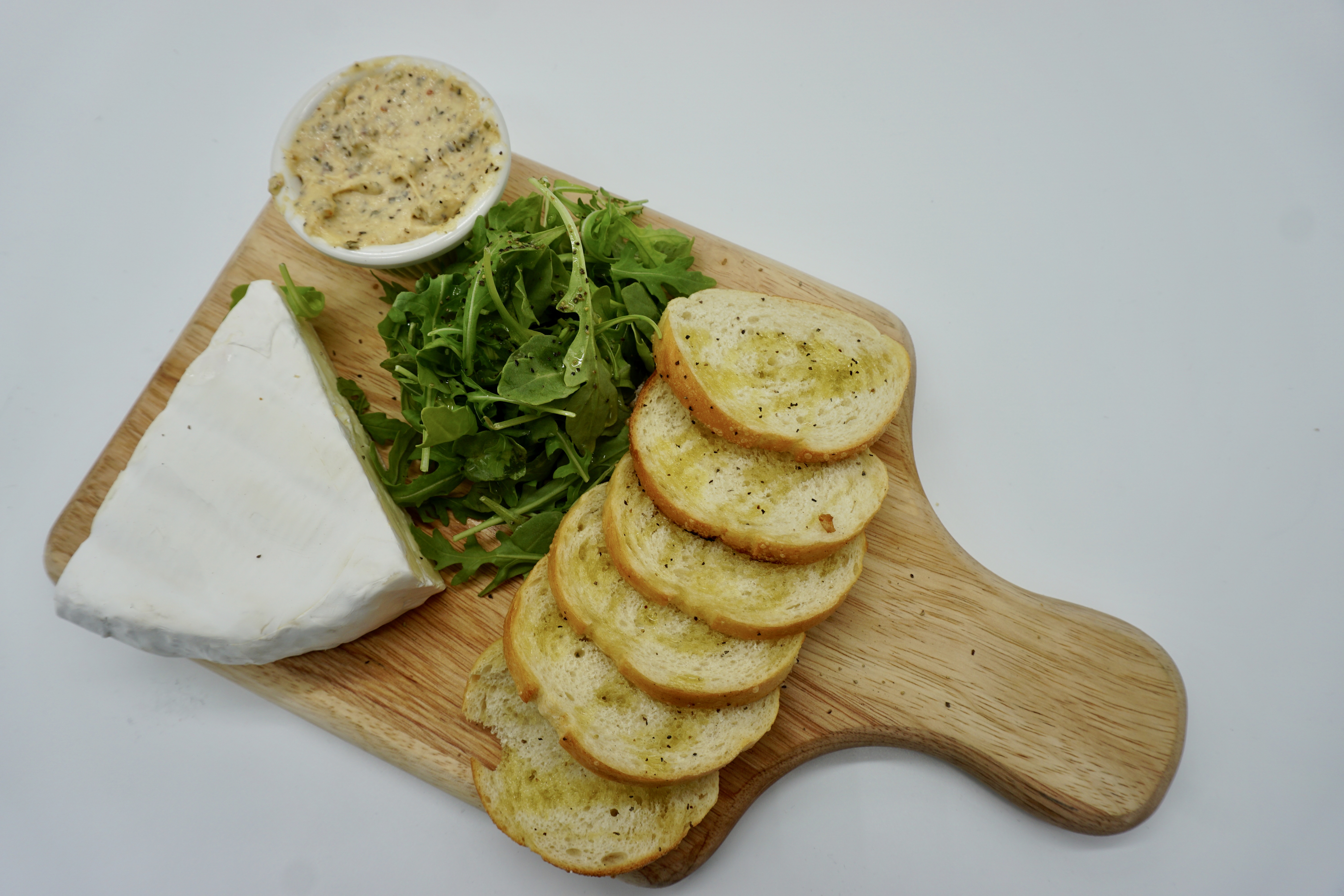 Order Sourdough Crostini and Brie food online from Flagship Taproom store, Santa Rosa on bringmethat.com