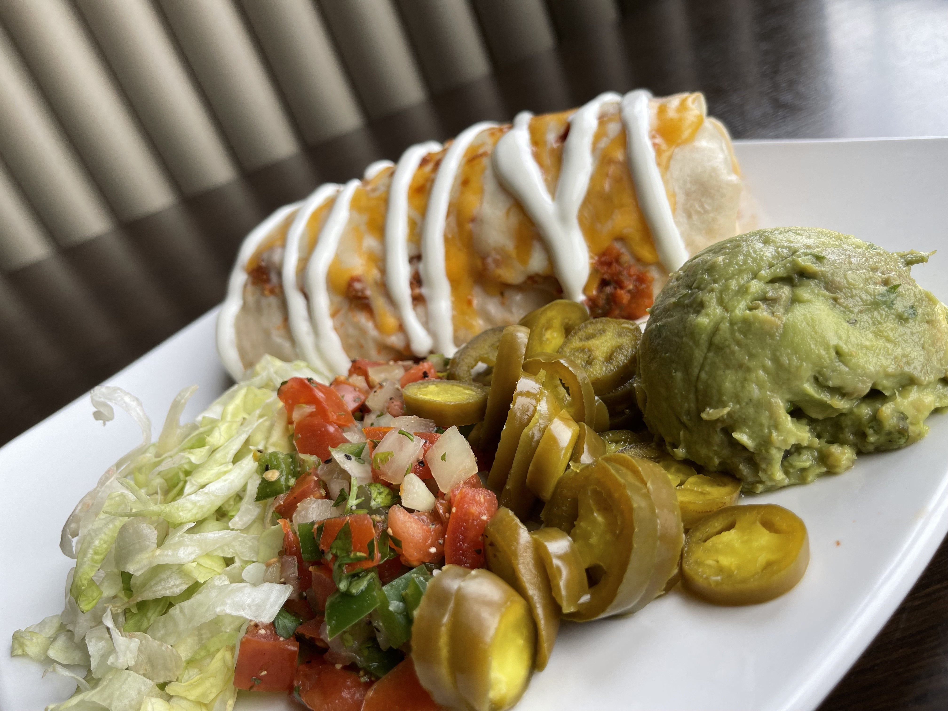 Order Wet Burrito food online from One North Kitchen & Bar store, Jackson on bringmethat.com