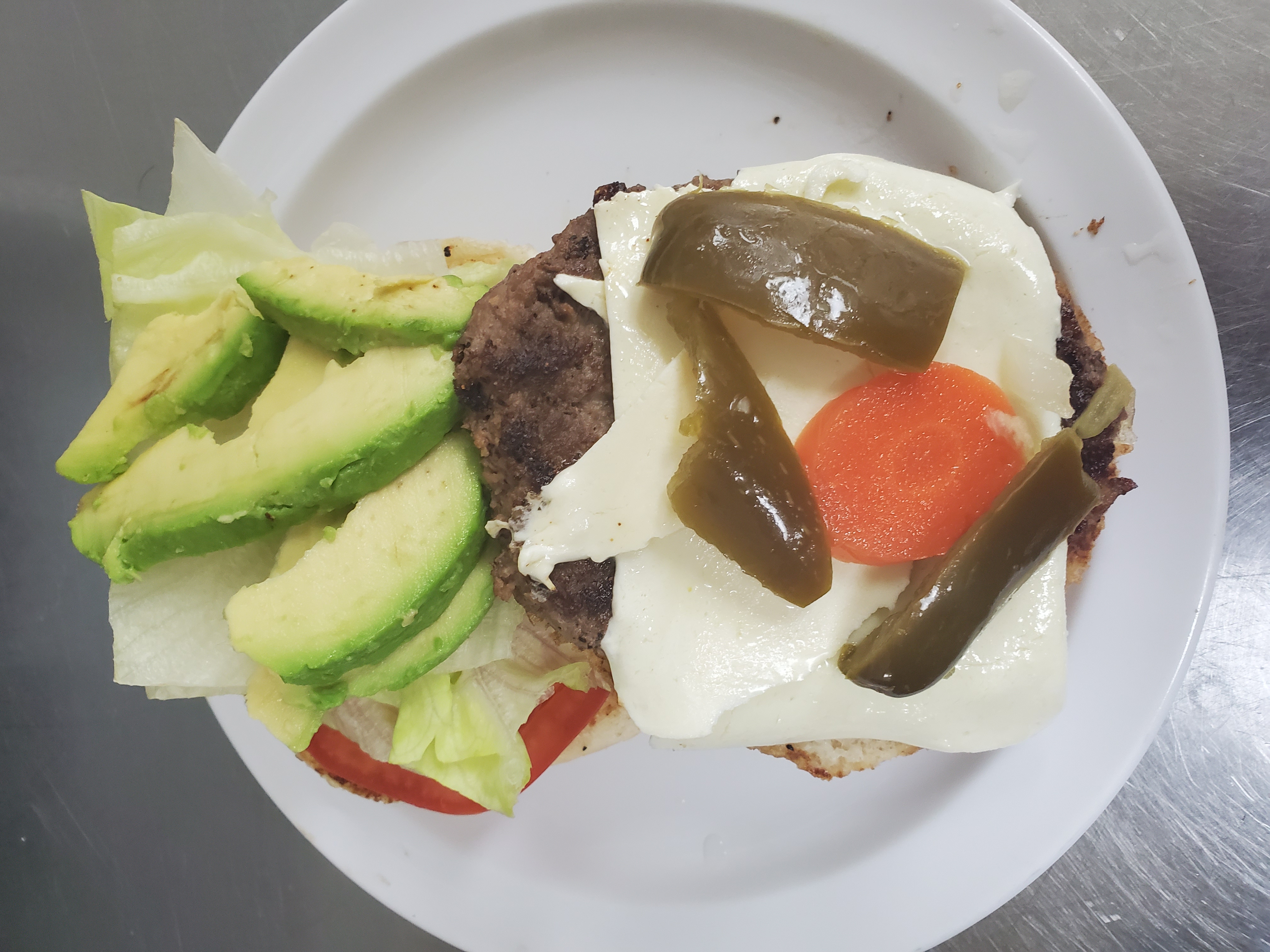 Order Burger a la Mexicana food online from Aminas Cafe store, Bronx on bringmethat.com